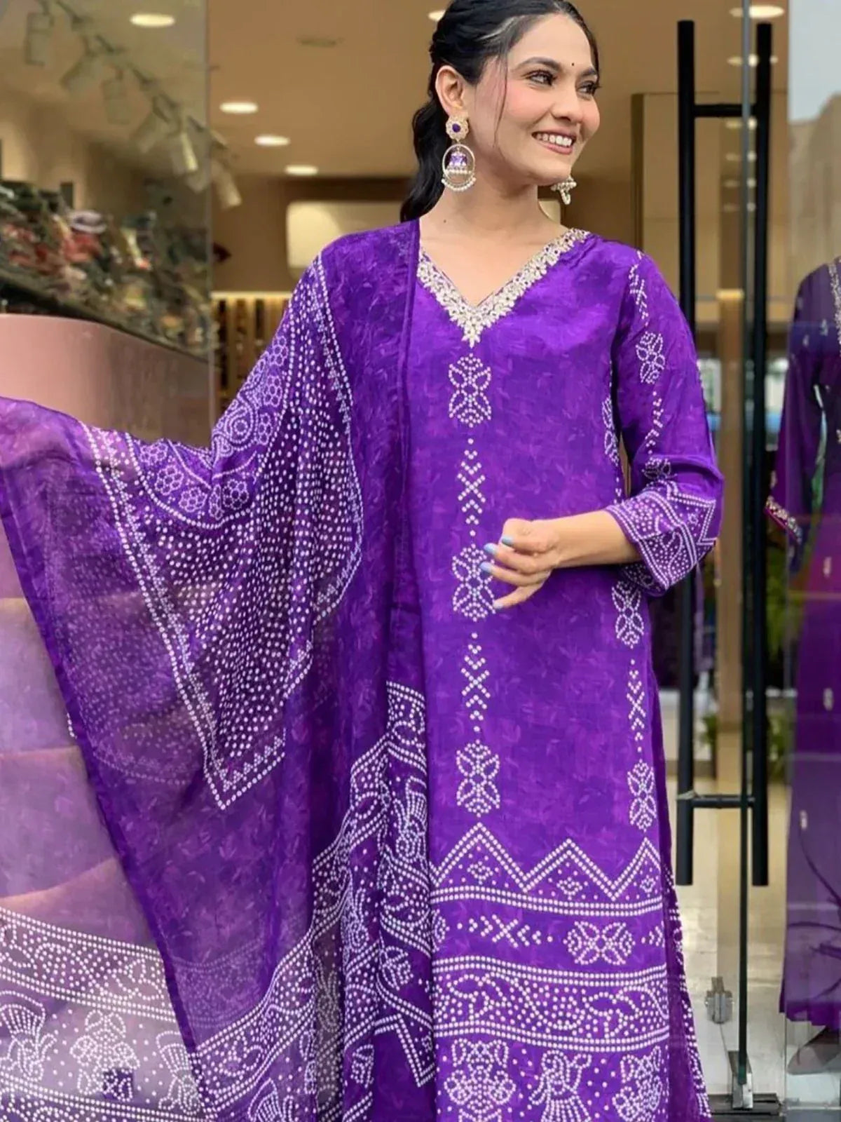 Purple ethnic salwar kameez with white embroidery and matching dupatta, perfect for festive occasions
