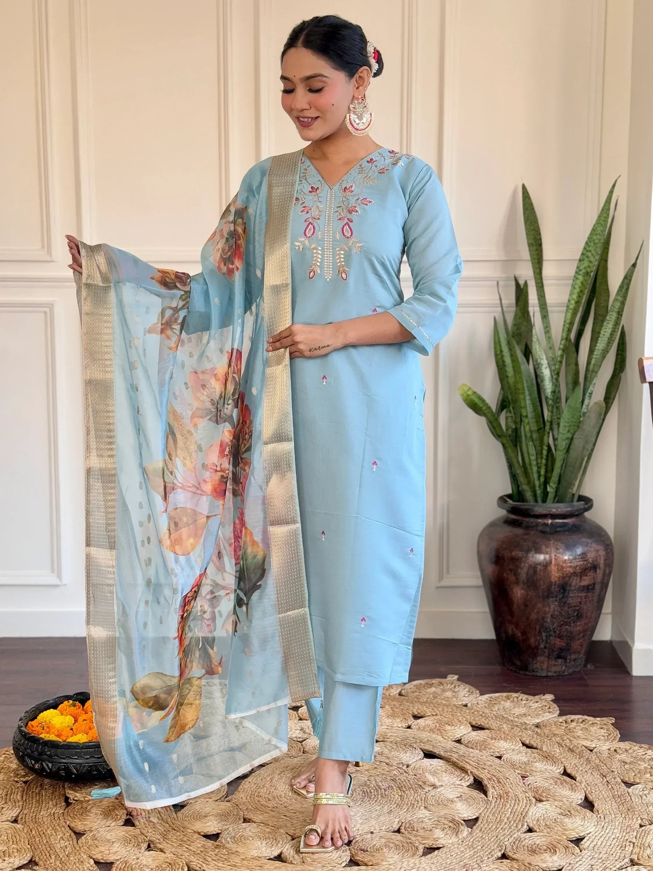 Light blue embroidered kurta set with floral dupatta, perfect for ethnic occasions