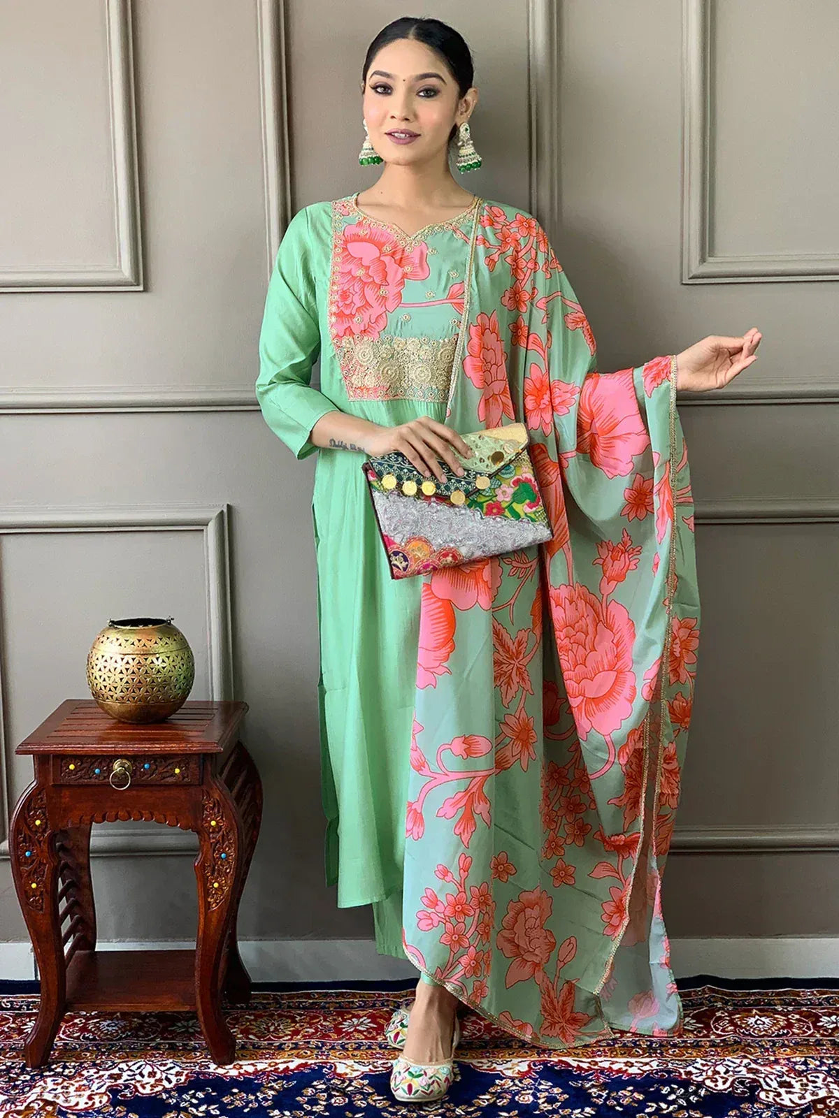 Mint green floral printed salwar kameez with gold embroidery, perfect for Indian ethnic wear occasions