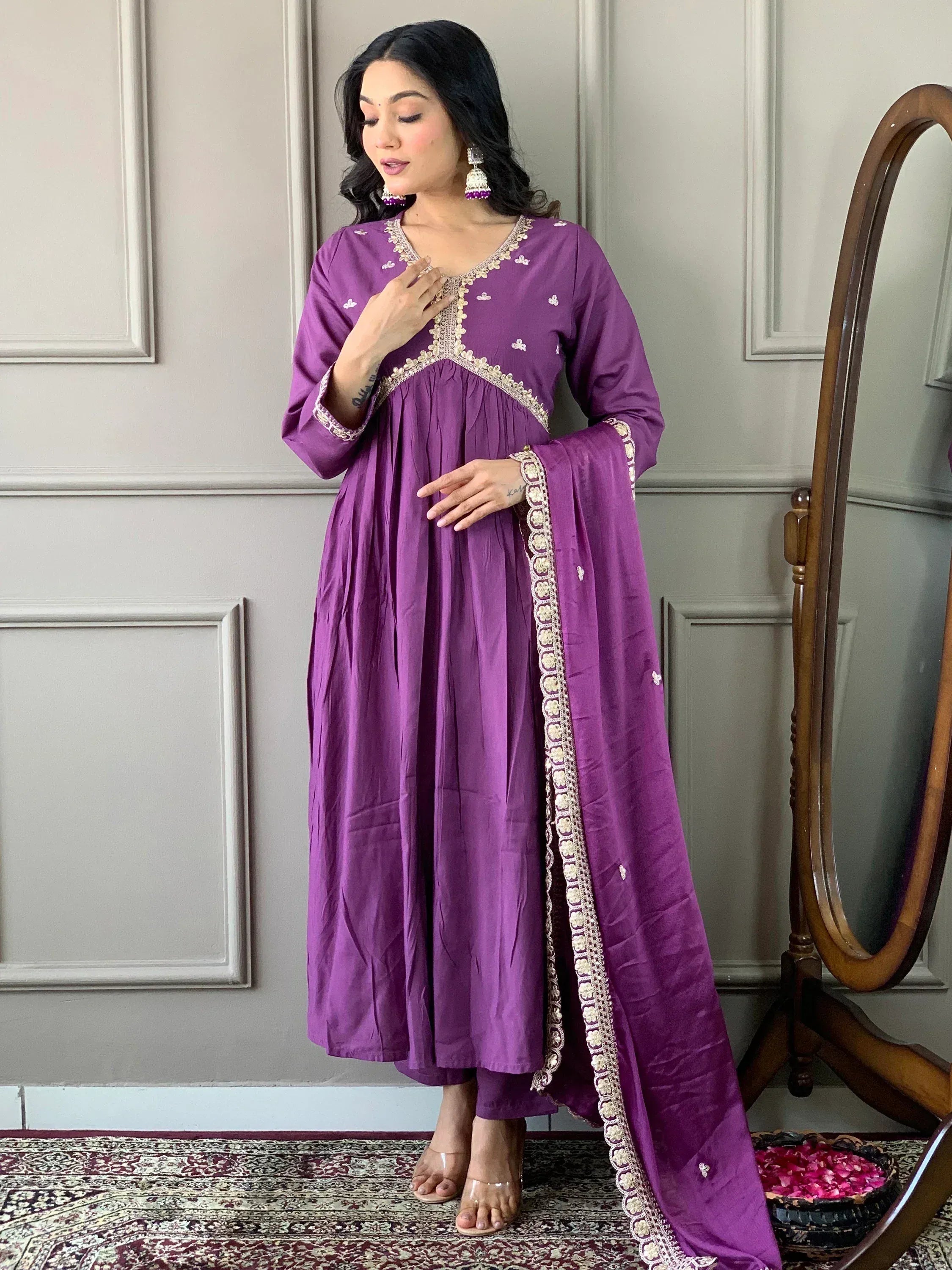 Purple ethnic anarkali suit with gold embroidery, perfect for Indian occasions and festive wear.