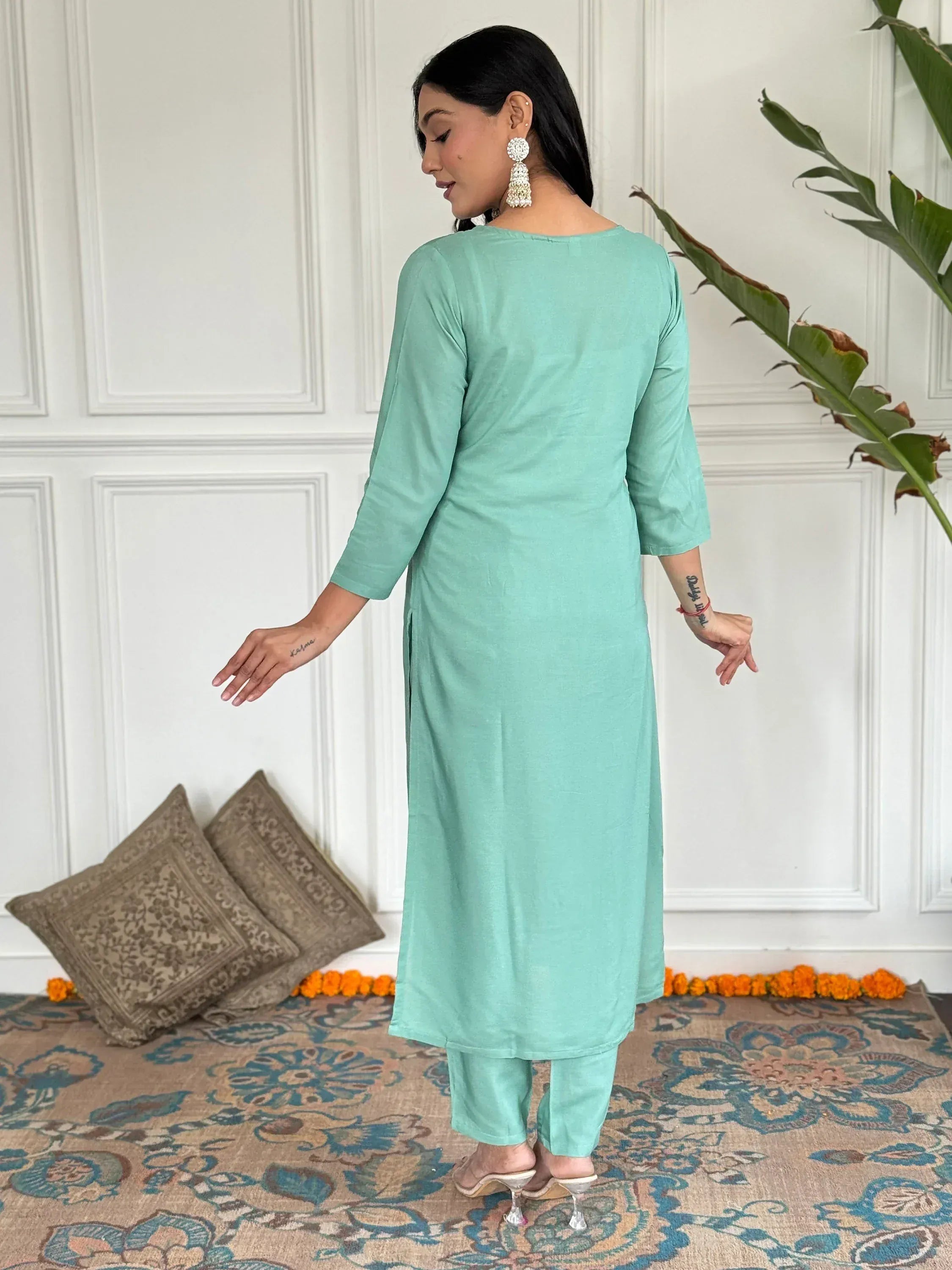 Mint green ethnic kurta set with matching pants, perfect for Indian occasions and festive wear.