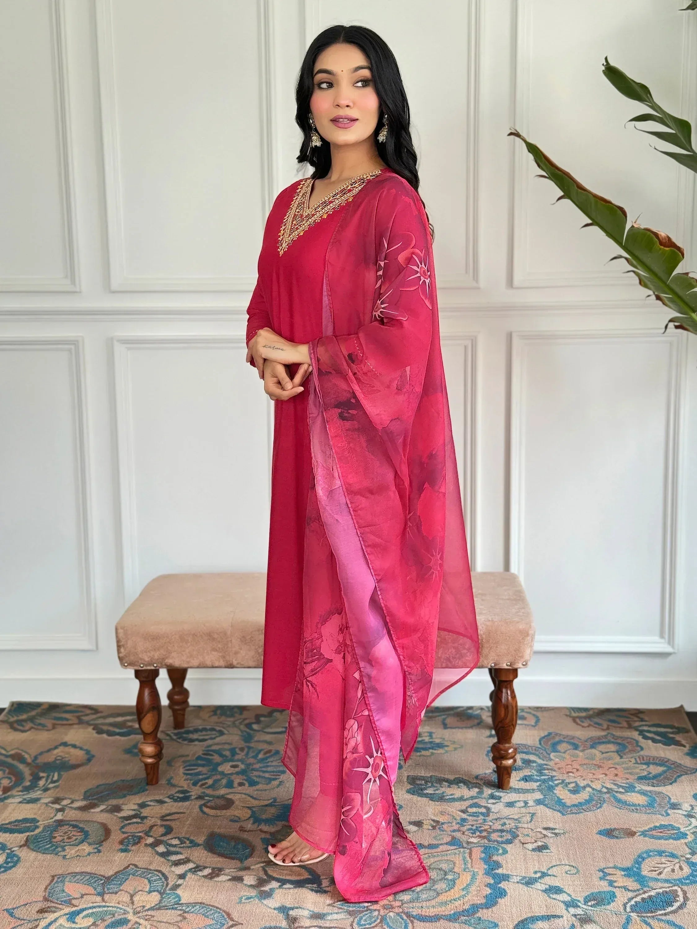 Pink ethnic gown with floral dupatta and gold embroidery, stylish Indian wear for women