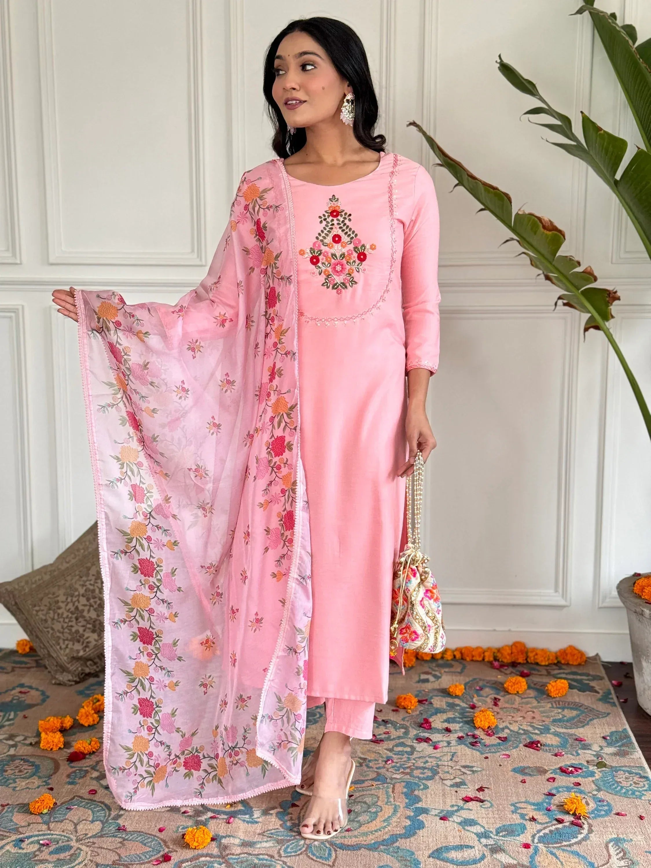 Pink embroidered salwar kameez with floral dupatta, perfect for ethnic occasions and Indian wear