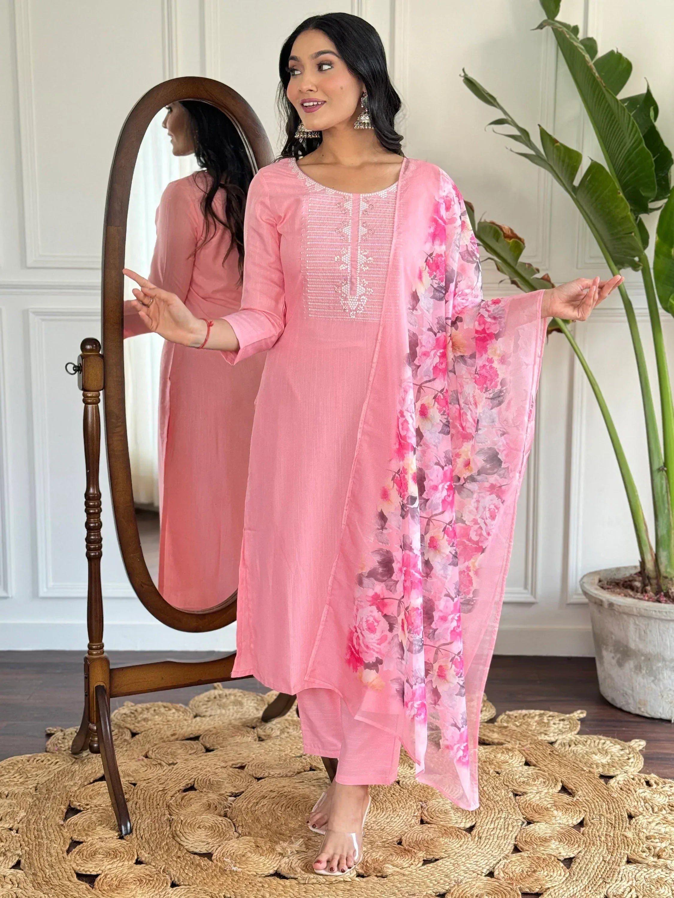 Pink ethnic kurta set with floral dupatta, perfect for Indian wear occasions