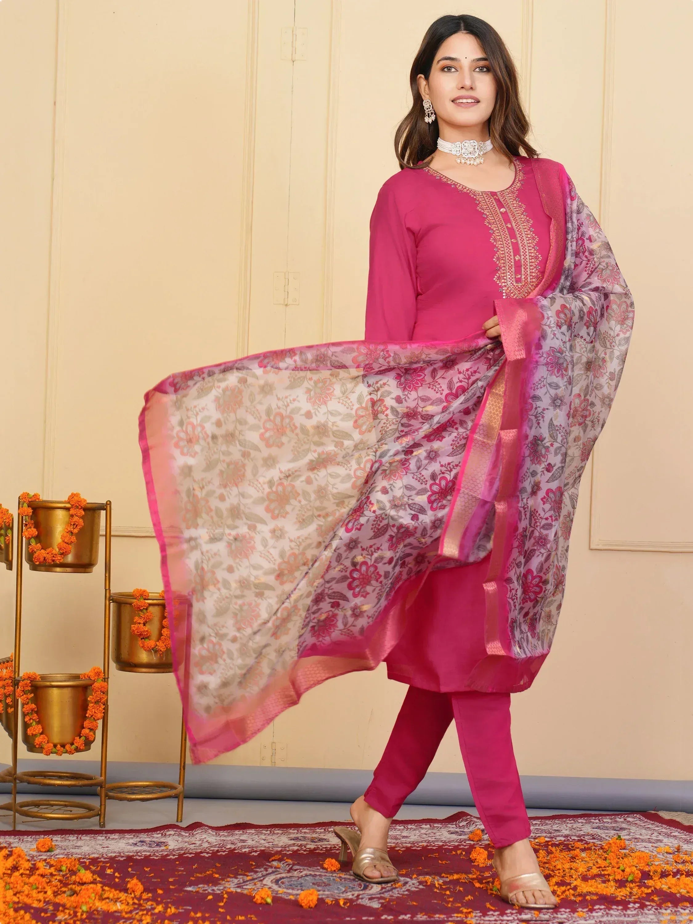 Pink embroidered salwar kameez with floral dupatta, perfect for Indian ethnic occasions
