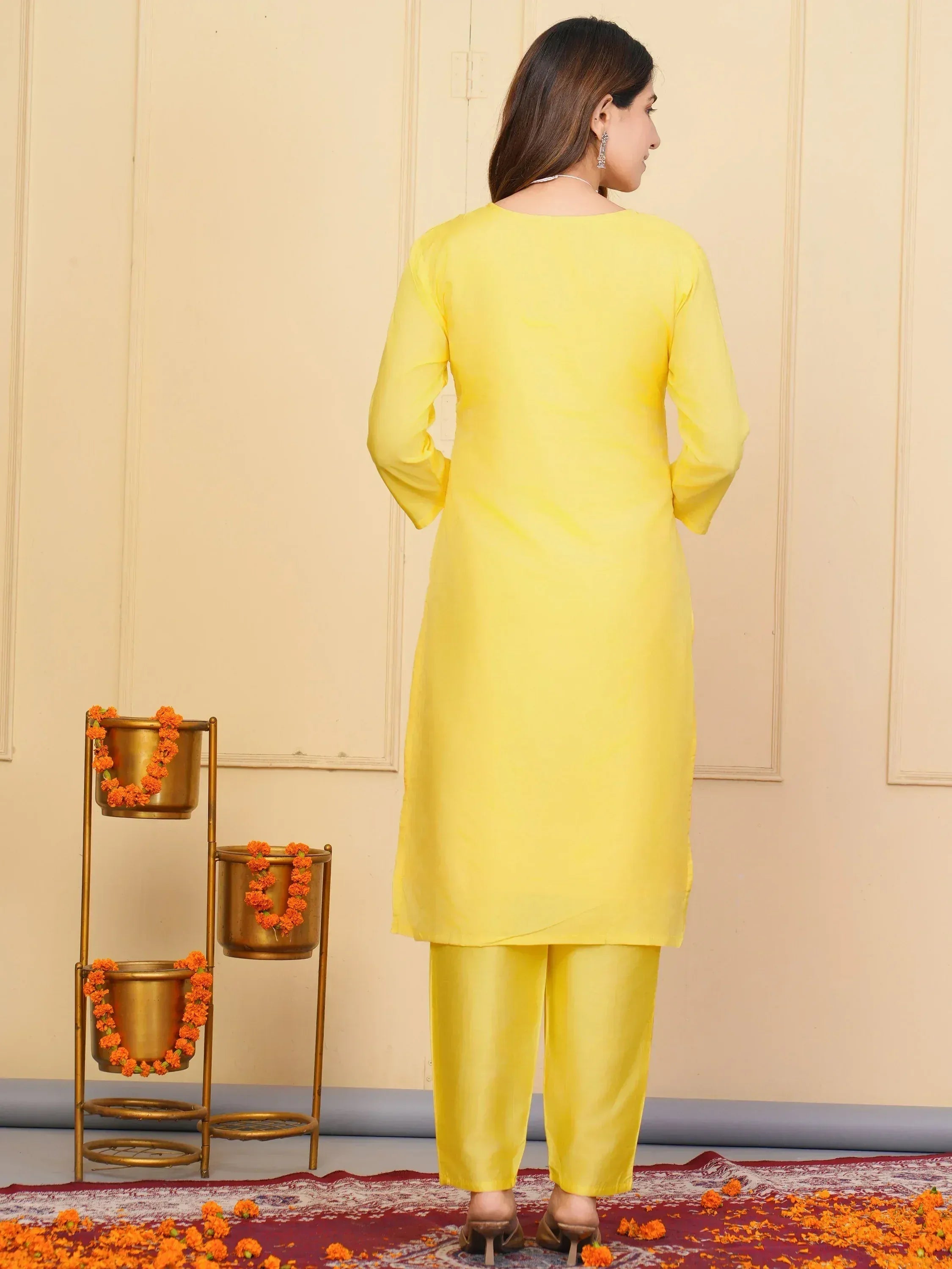 Yellow ethnic kurta set with matching pants, perfect for Indian festive occasions and traditional wear.