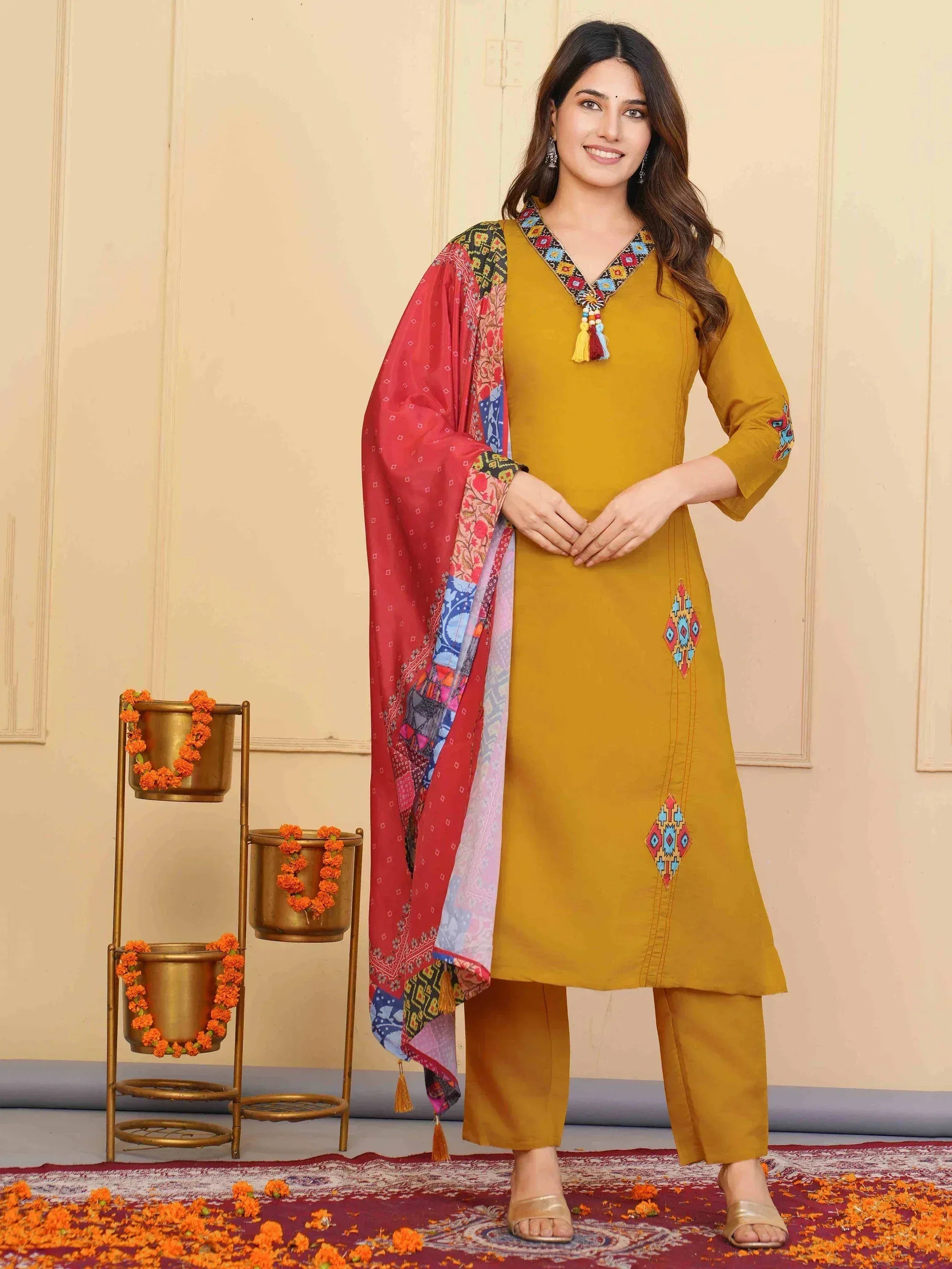Mustard yellow embroidered kurta with matching pants and colorful dupatta, Indian ethnic wear