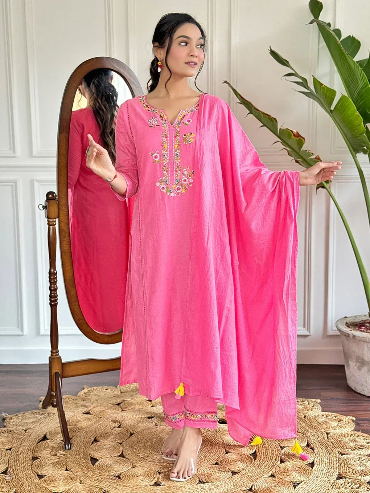 Pink embroidered ethnic kurta with floral detailing and matching pants