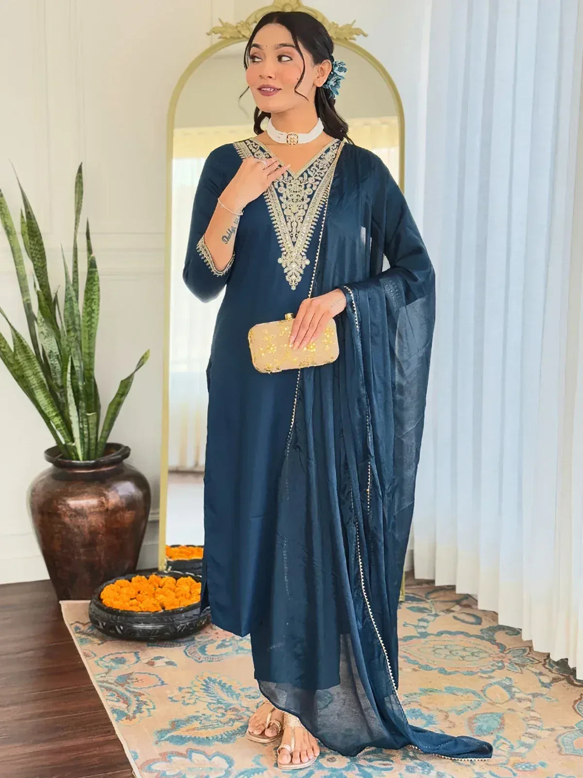 Elegant navy blue embroidered ethnic gown with matching dupatta, perfect for Indian festive occasions.
