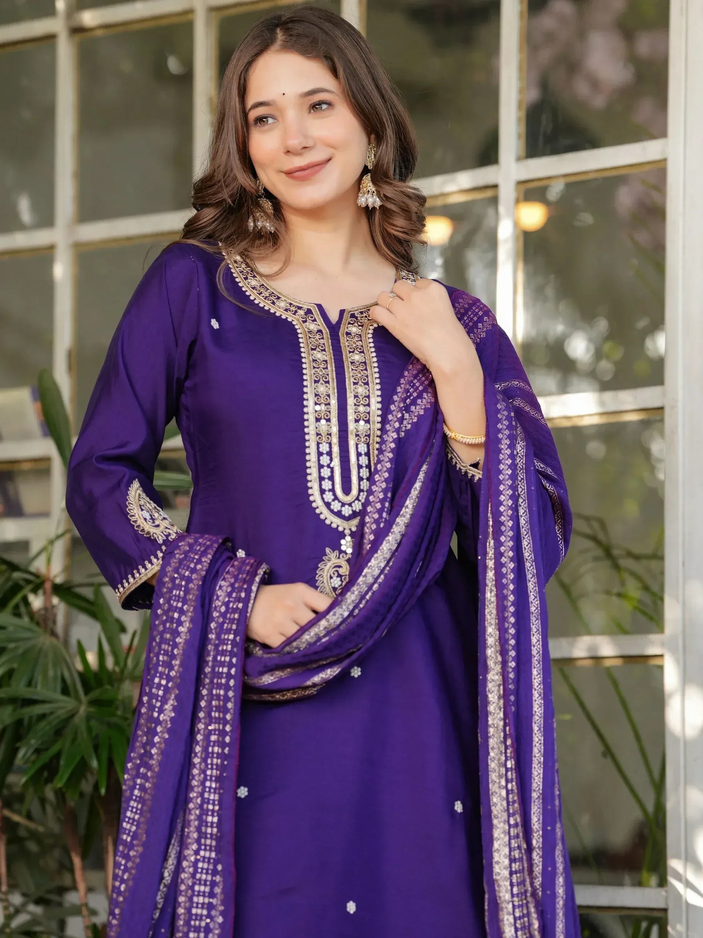 Purple embroidered salwar kameez with gold detailing, perfect for Indian ethnic wear occasions
