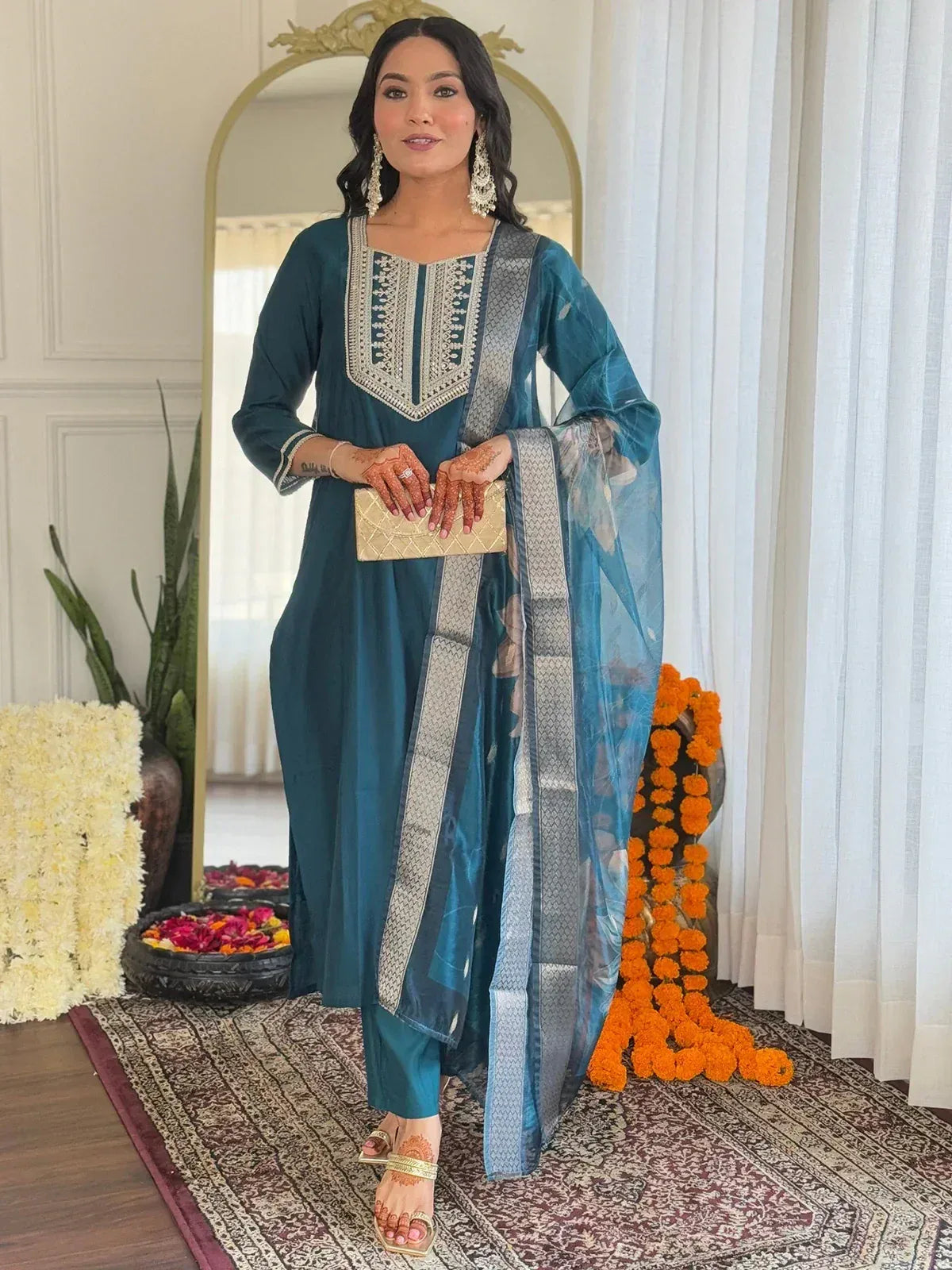 Teal embroidered salwar kameez with matching dupatta, perfect for Indian ethnic occasions and festive wear.