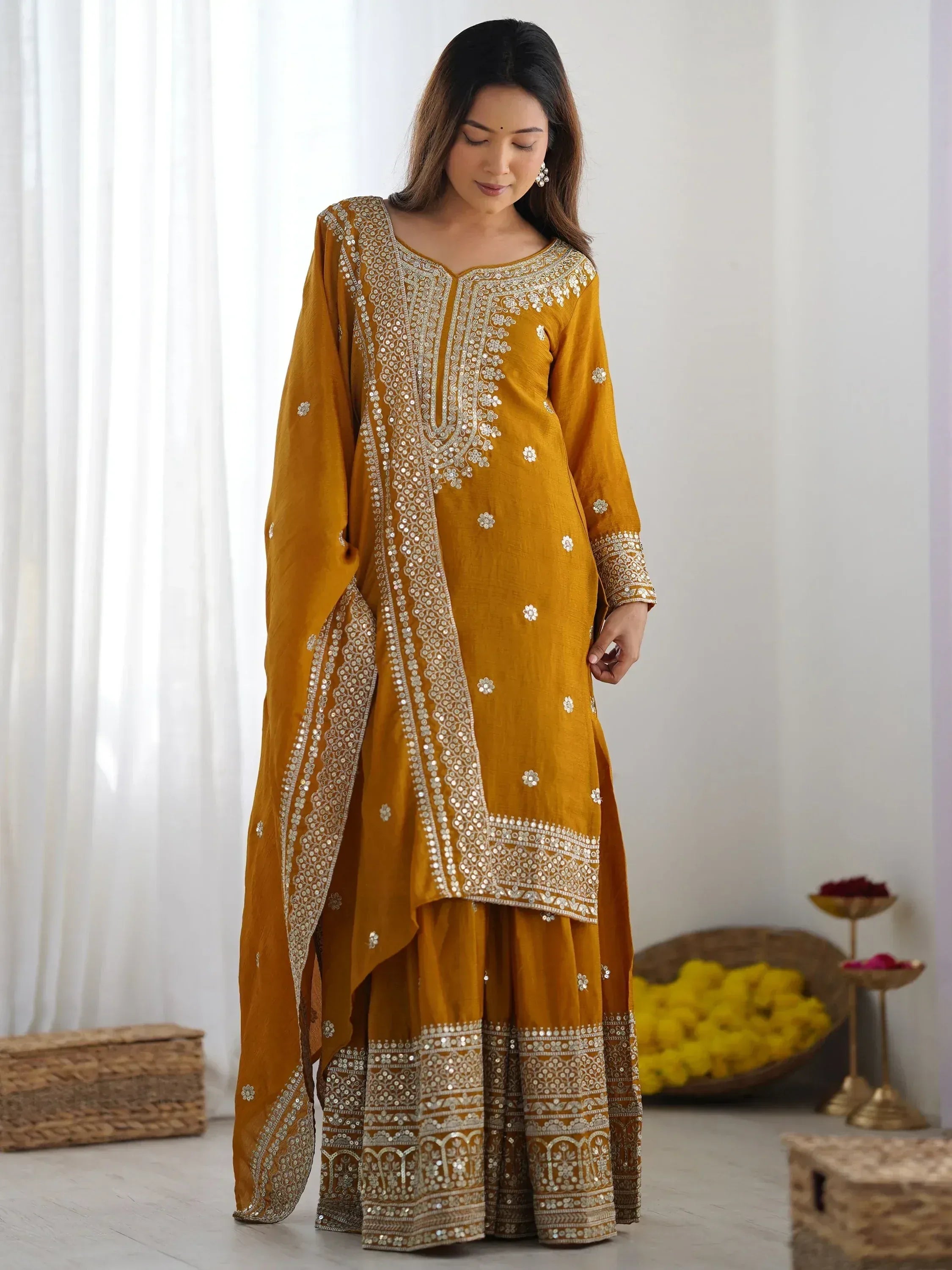 Mustard yellow ethnic salwar kameez with mirror work and floral embroidery for women