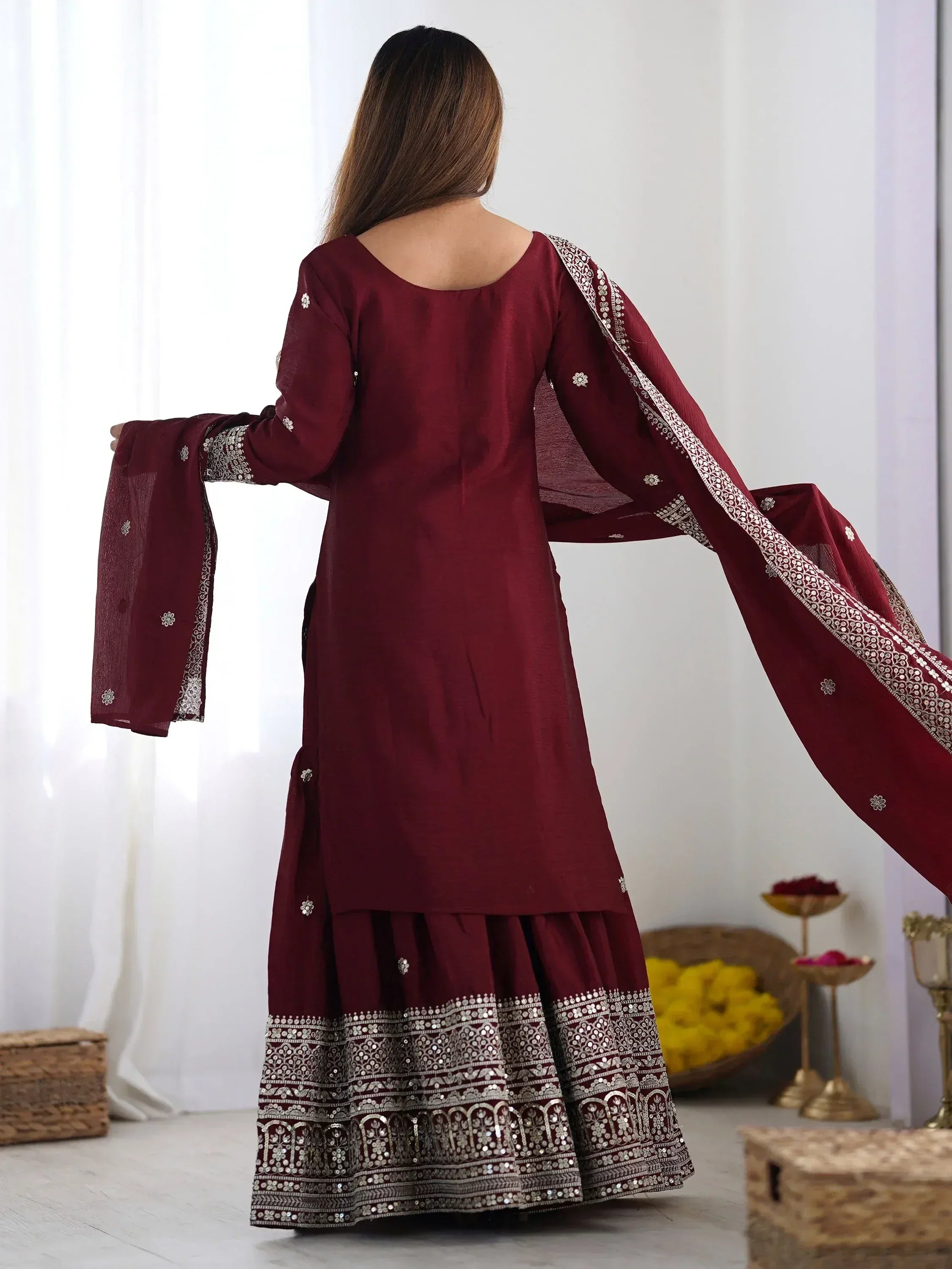 Maroon ethnic anarkali with silver embroidery and flared skirt, perfect for Indian festive occasions