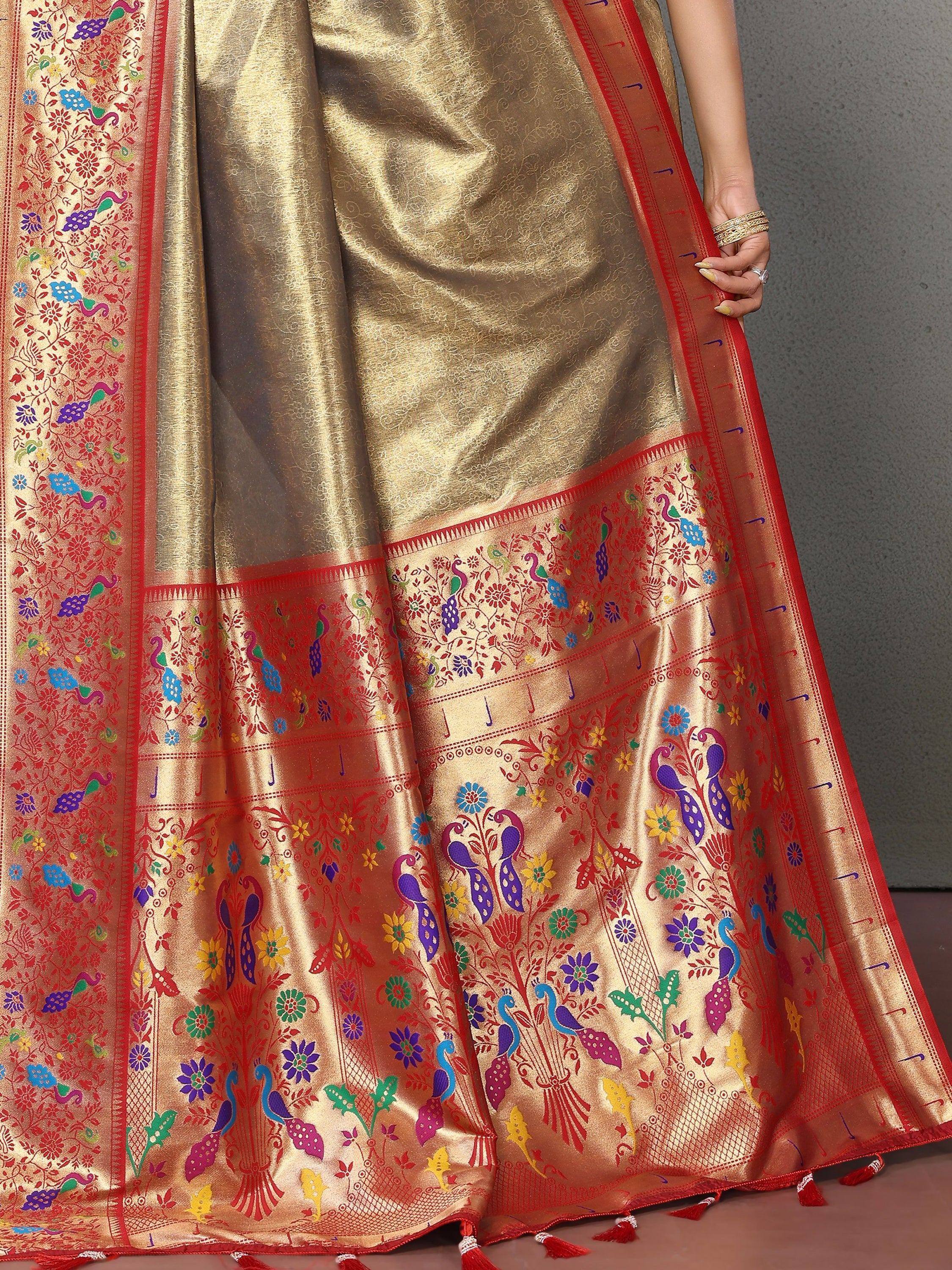 Golden saree with colorful peacock and floral embroidery, perfect for ethnic occasions