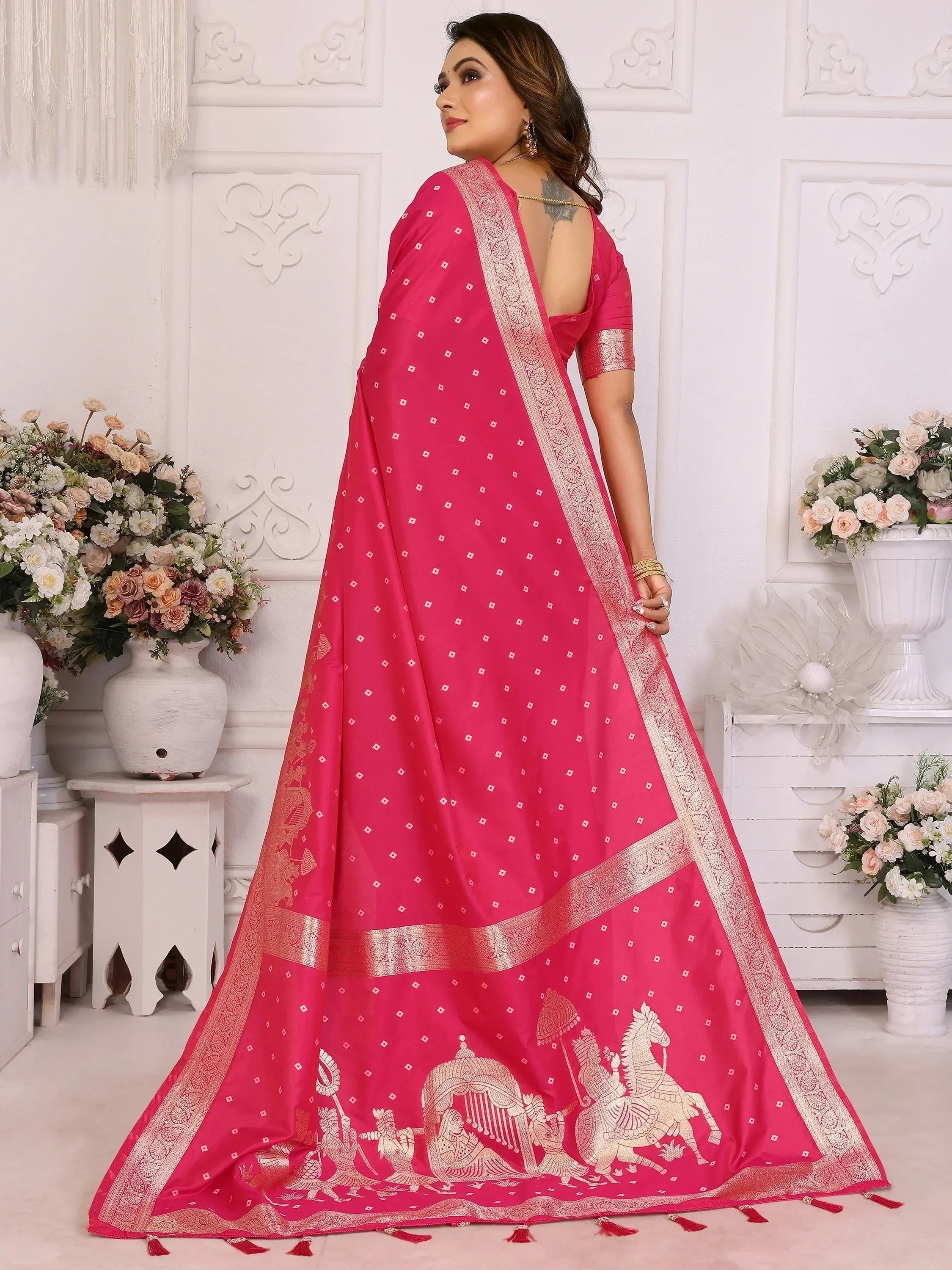 Pink saree with gold embroidery and horse motifs, perfect for Indian ethnic wear