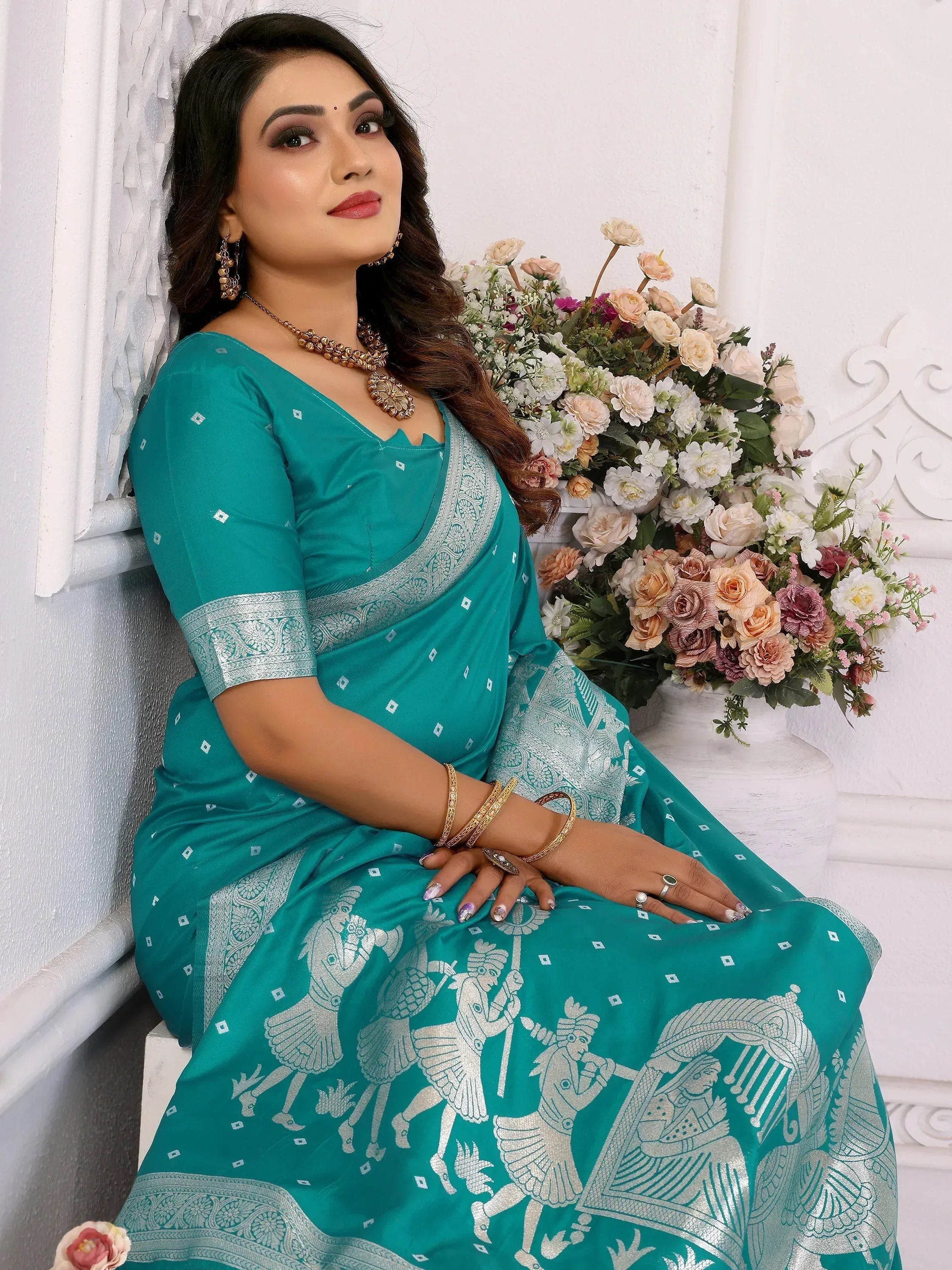Teal saree with silver warrior print, elegant ethnic wear for women