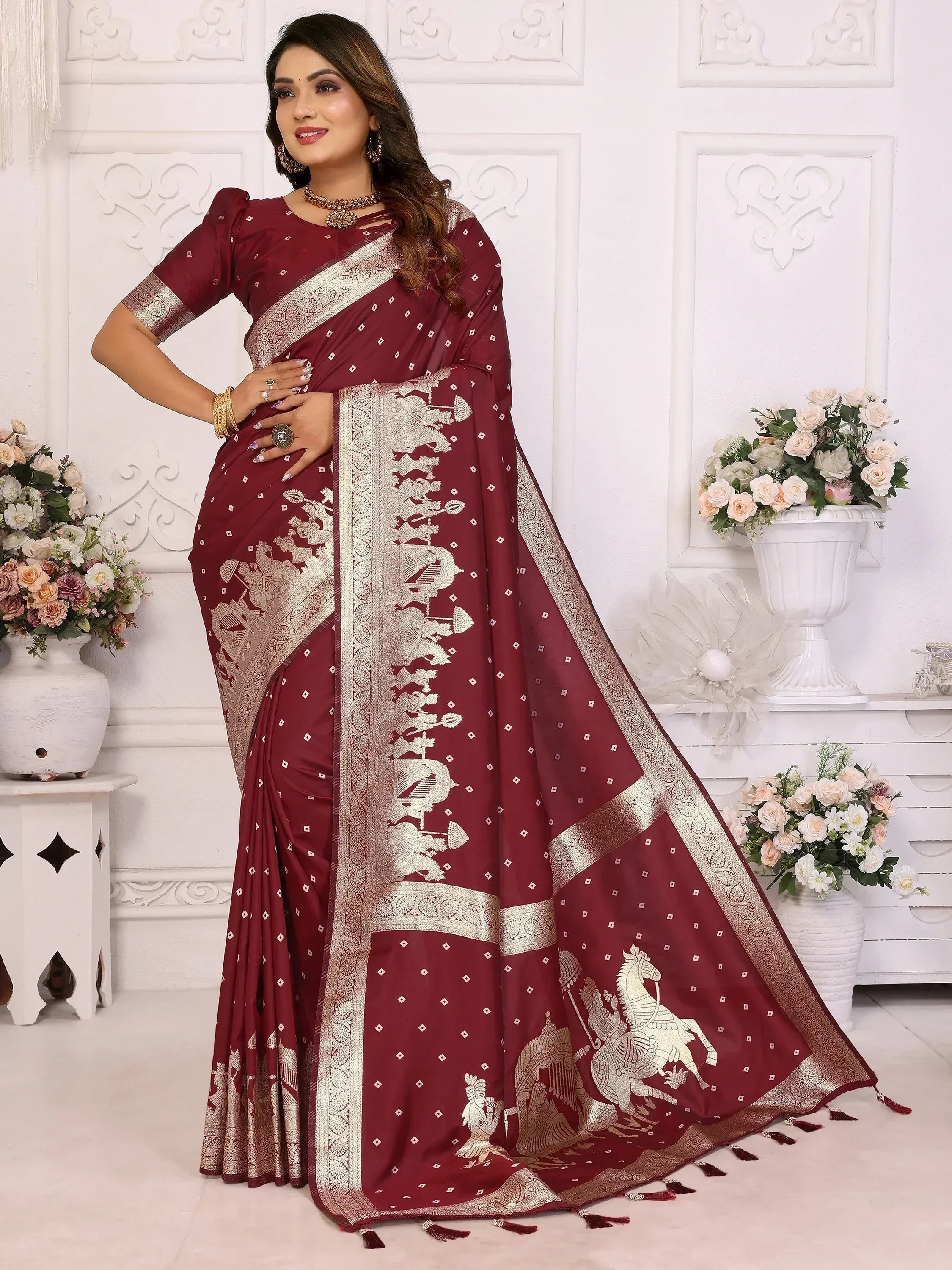 Maroon saree with gold horse & warrior motifs, elegant ethnic wear for women