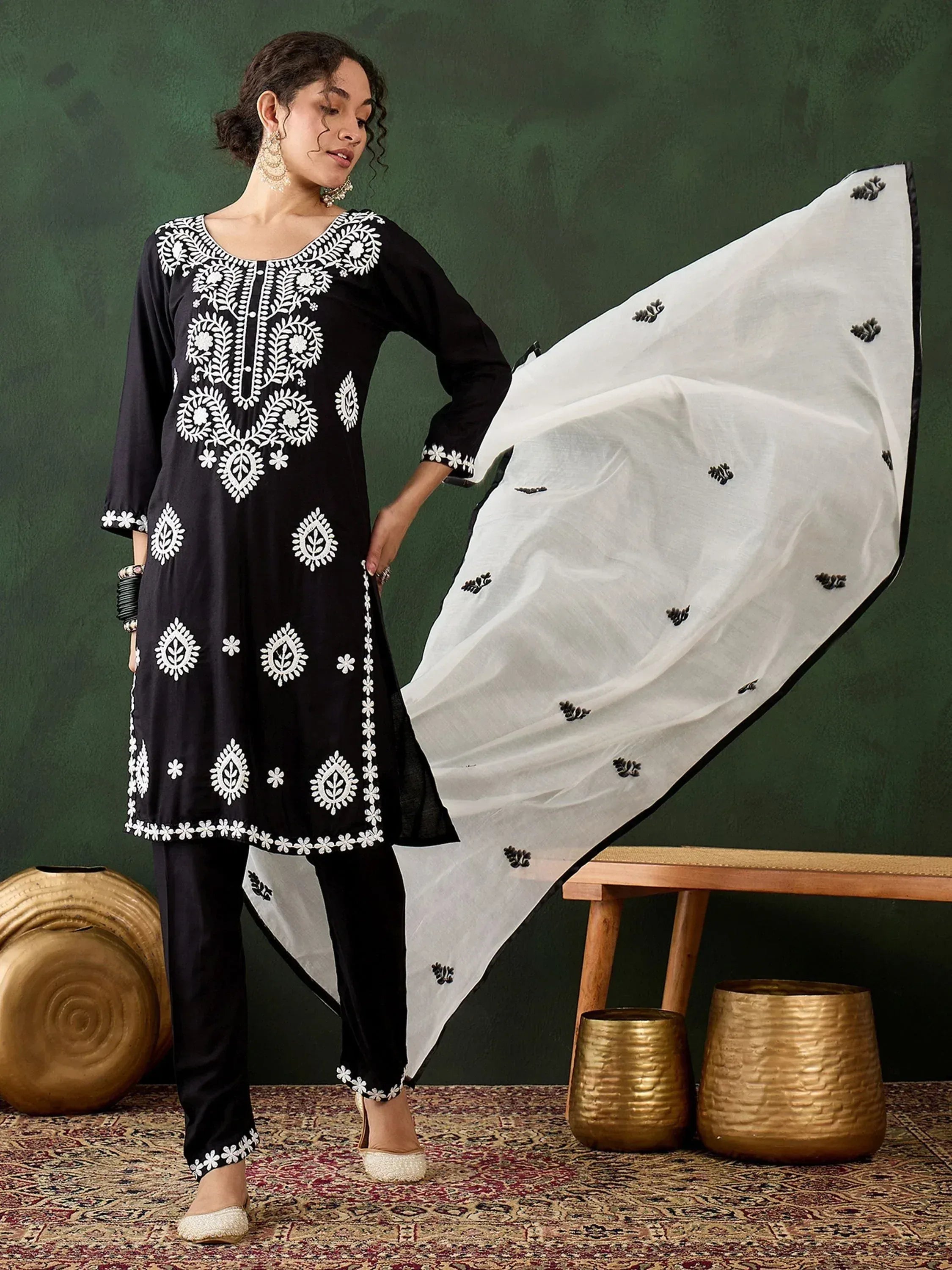 Black and white embroidered salwar kameez with floral design and matching dupatta