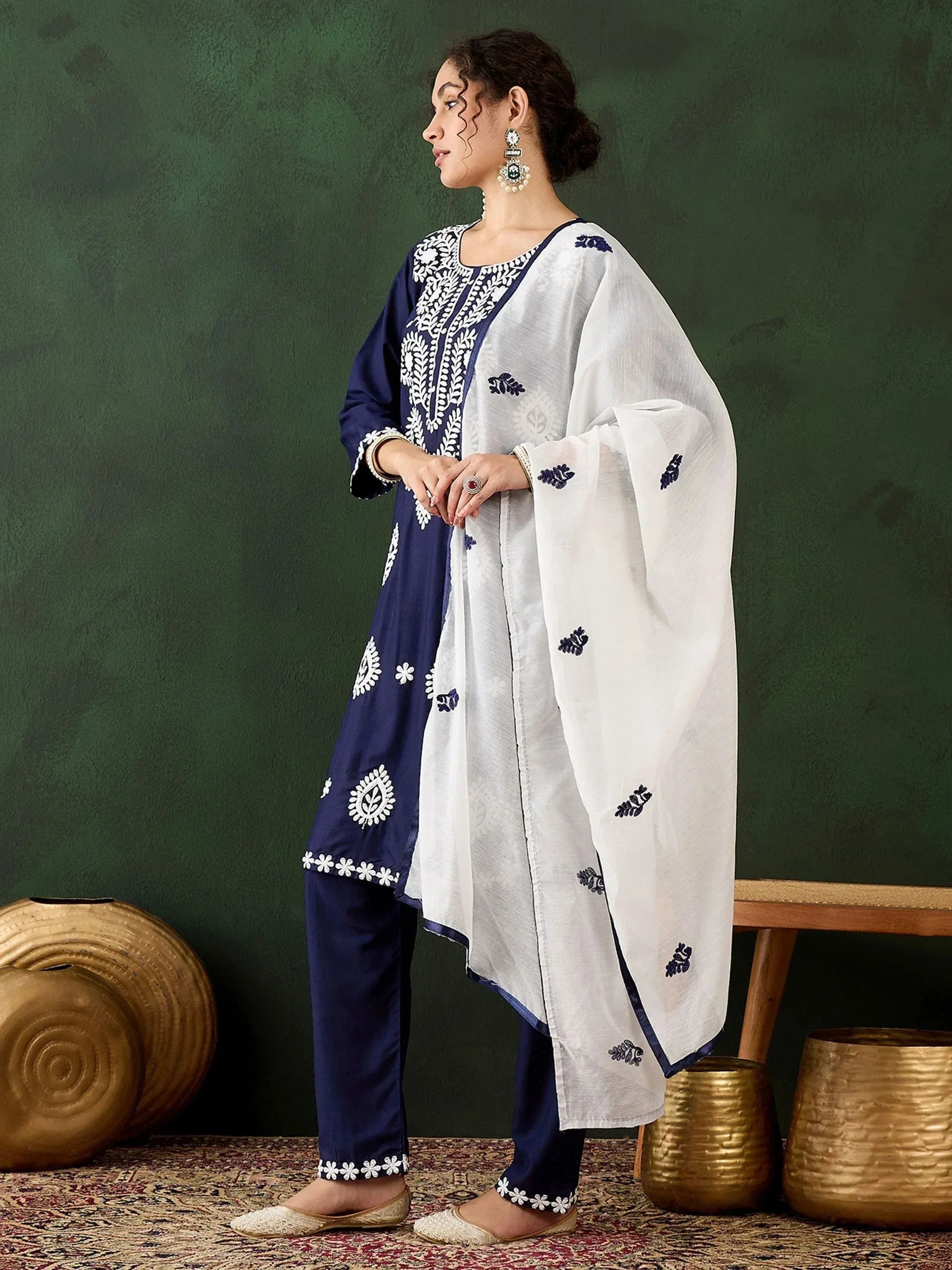 Navy blue and white embroidered salwar kameez with floral motifs, perfect for ethnic wear