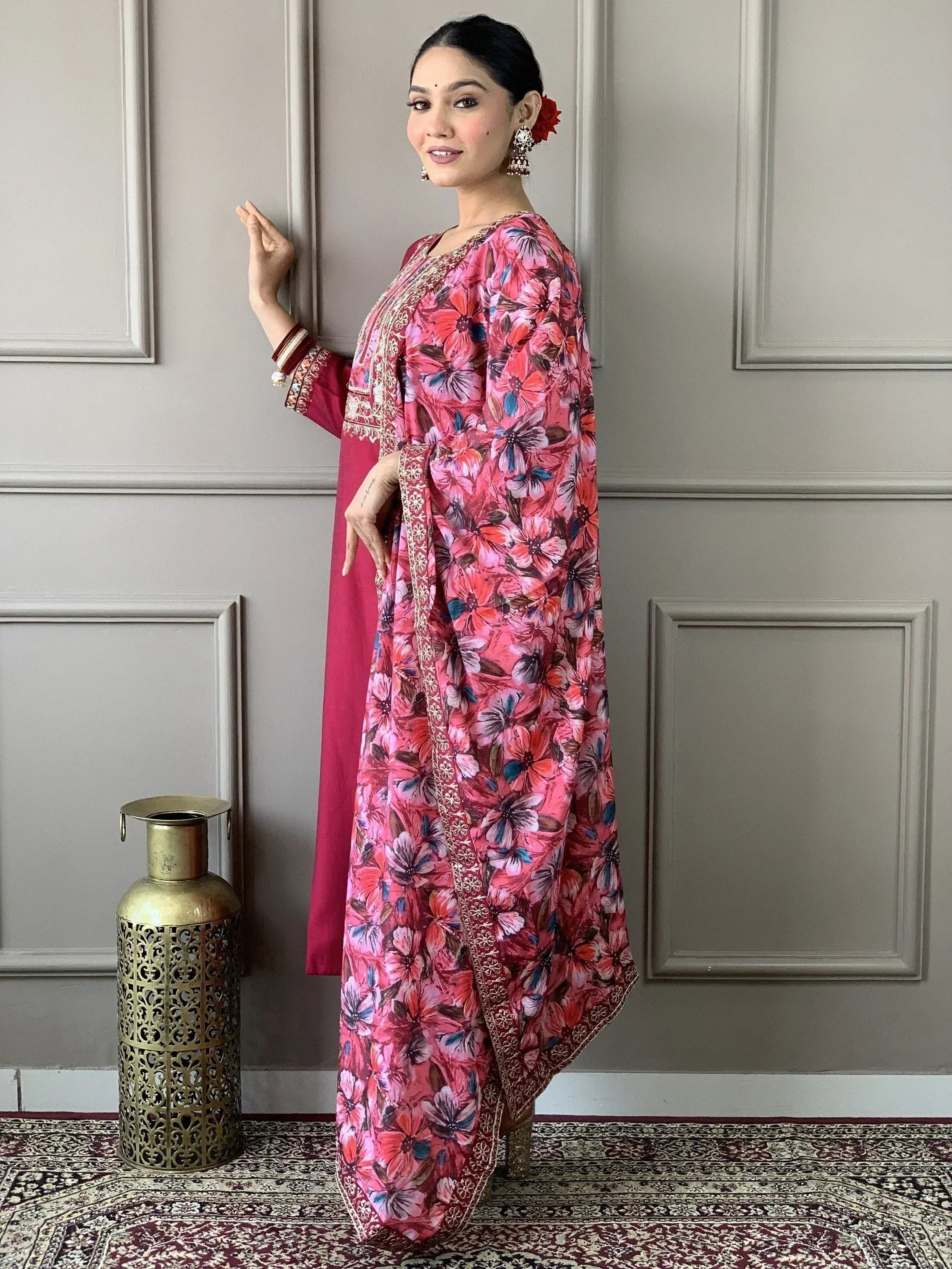 Pink floral printed ethnic gown with gold embroidery, perfect for Indian occasions