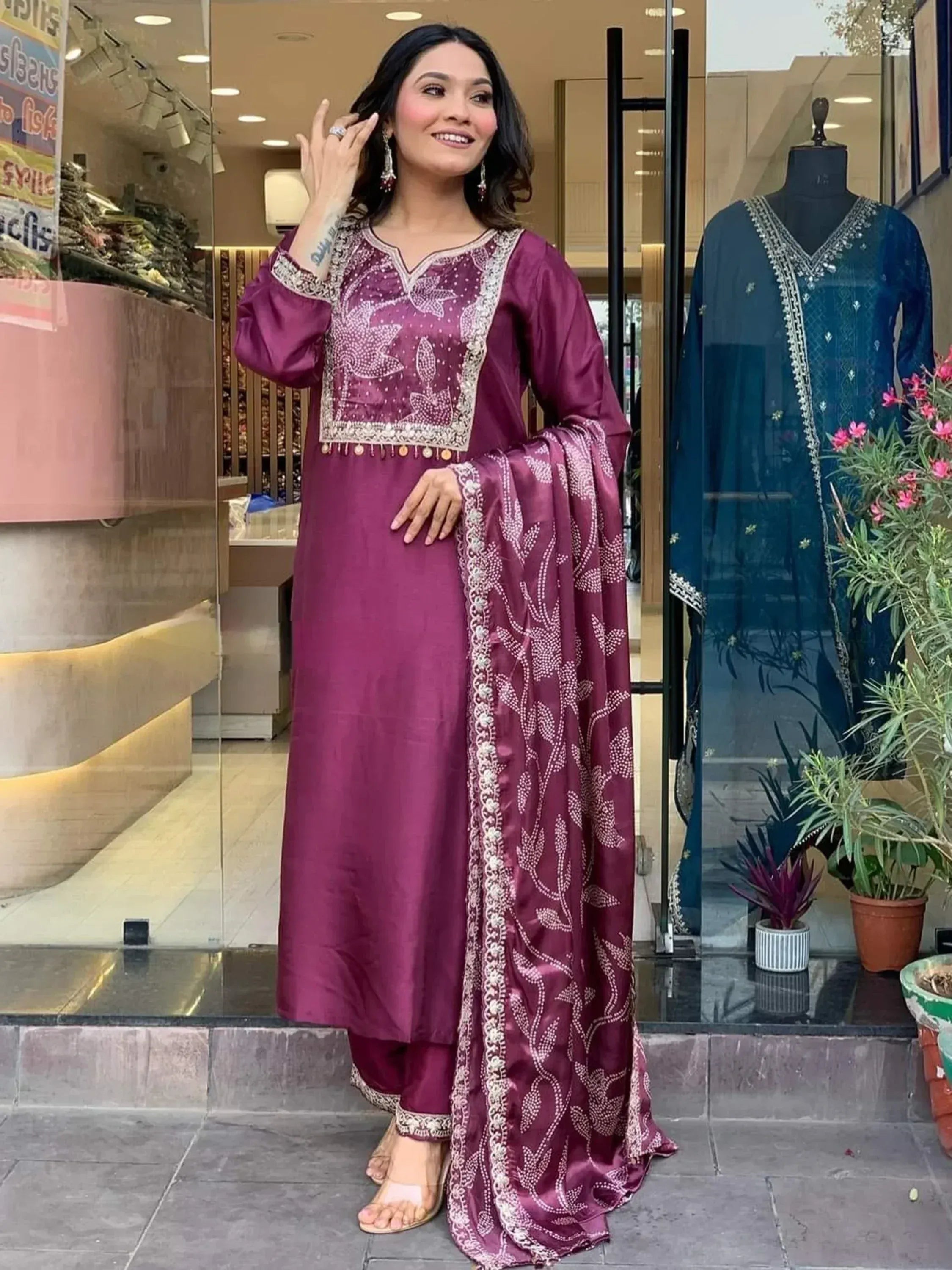 Woman in maroon embroidered salwar kameez with matching dupatta, Indian ethnic wear
