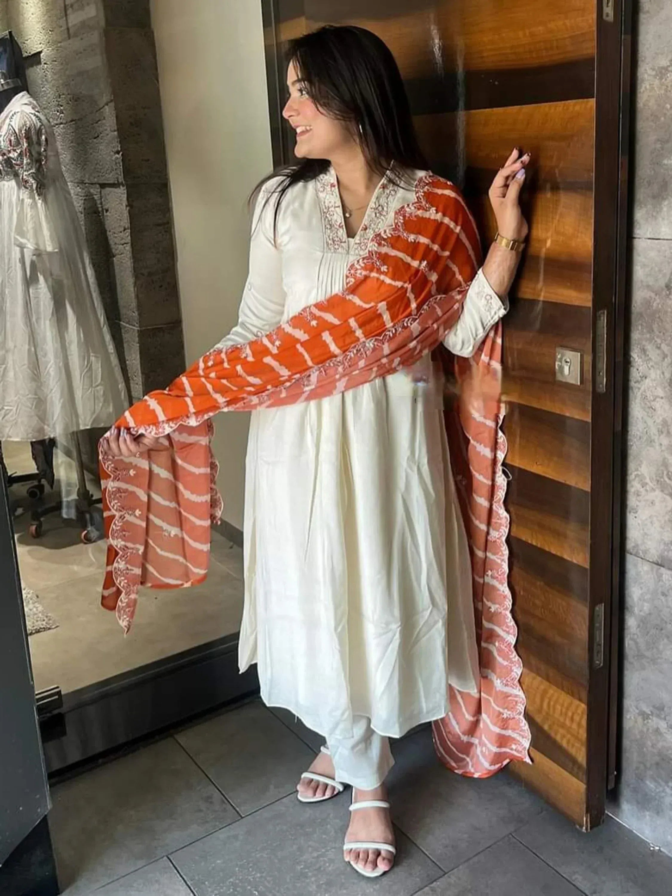 White ethnic kurta with orange printed dupatta, stylish Indian wear for women