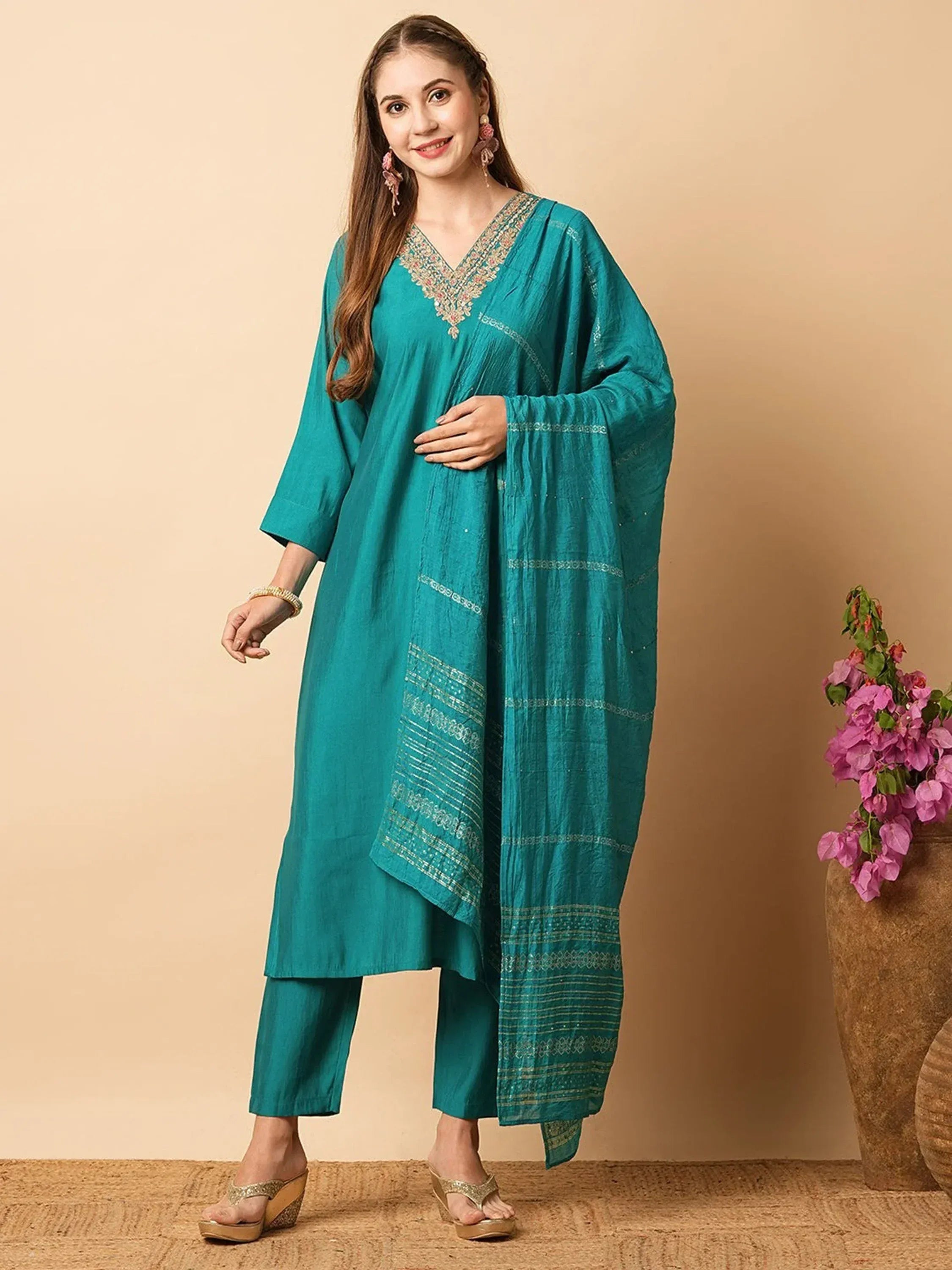 Teal embroidered kurta with matching palazzo and dupatta, styled for ethnic wear