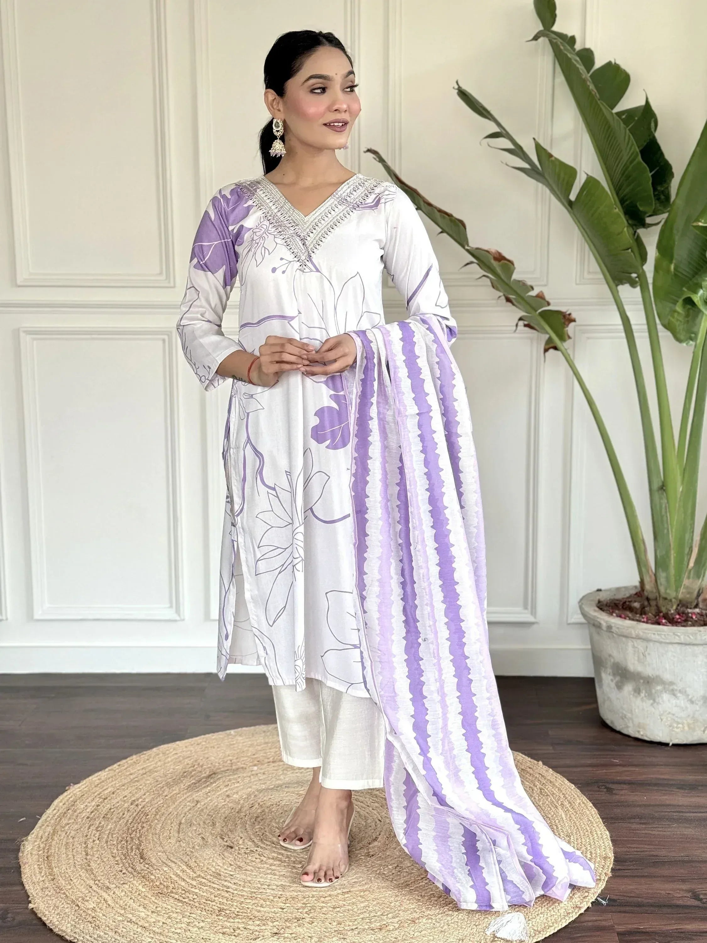 White and purple floral ethnic kurta with striped dupatta, styled for modern Indian wear