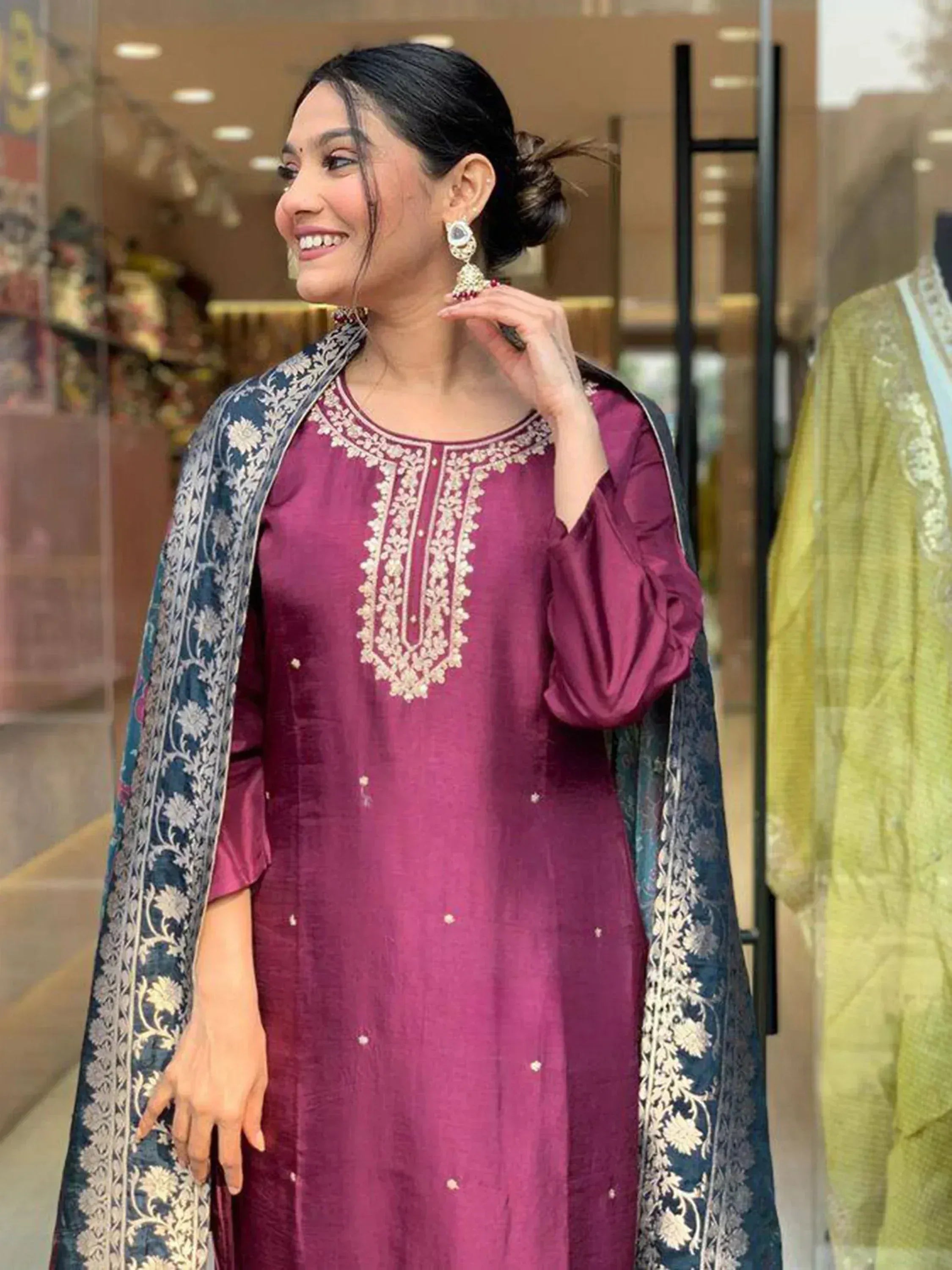 Woman in maroon embroidered kurta with blue floral dupatta, Indian ethnic wear
