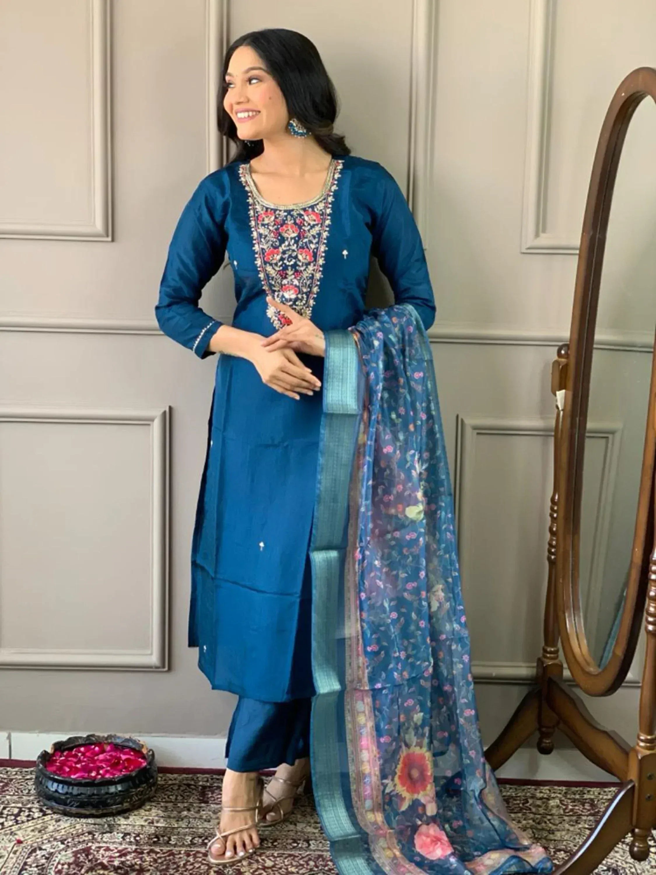 Blue embroidered salwar kameez with floral dupatta, perfect for Indian ethnic wear occasions.