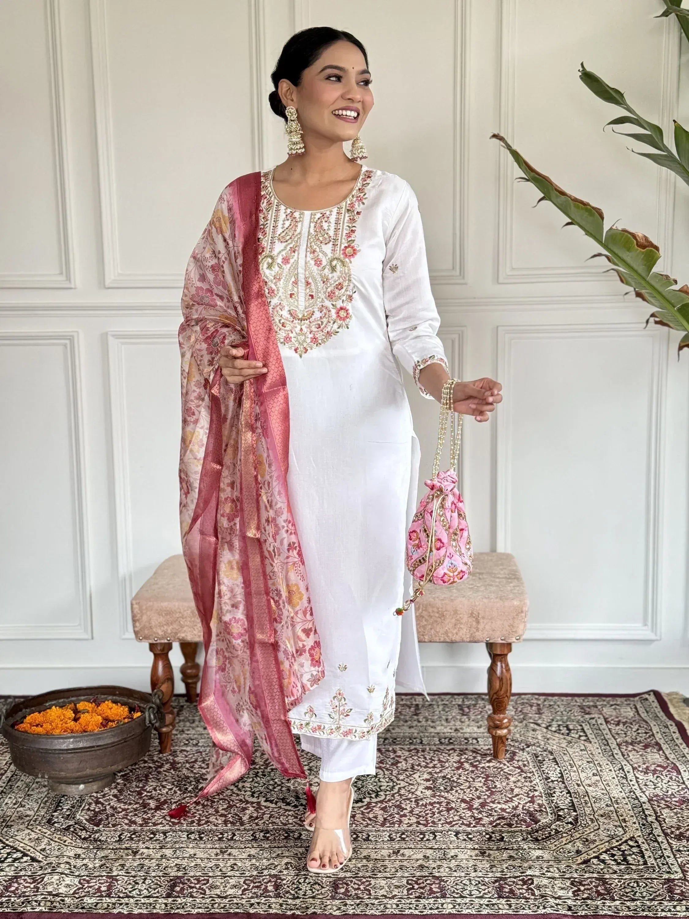 White embroidered kurta with pink floral dupatta, ethnic Indian wear for women
