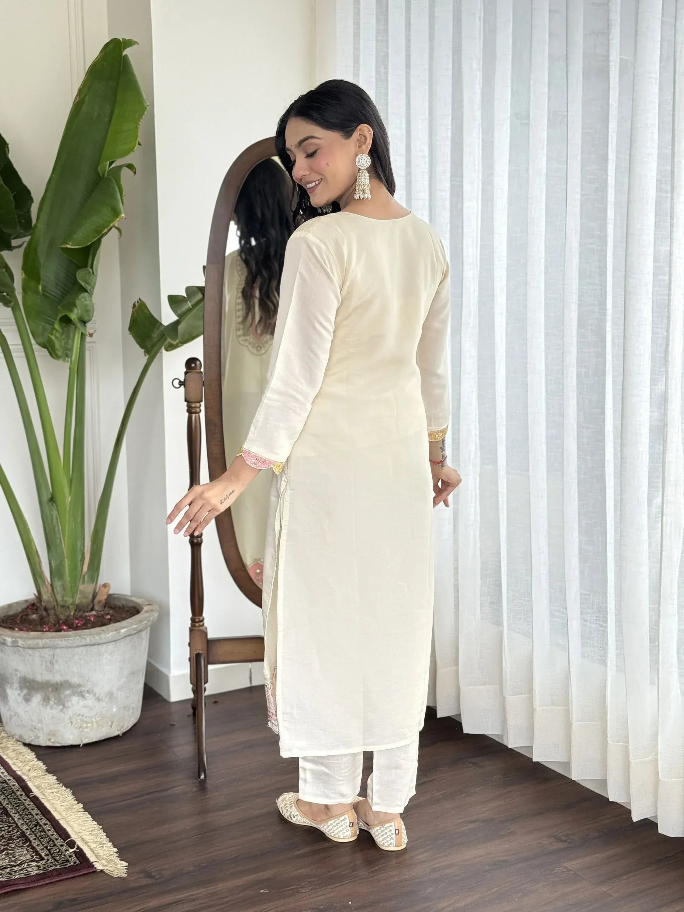Cream embroidered kurta with palazzo pants, ethnic Indian wear for women, styled with juttis and statement earrings