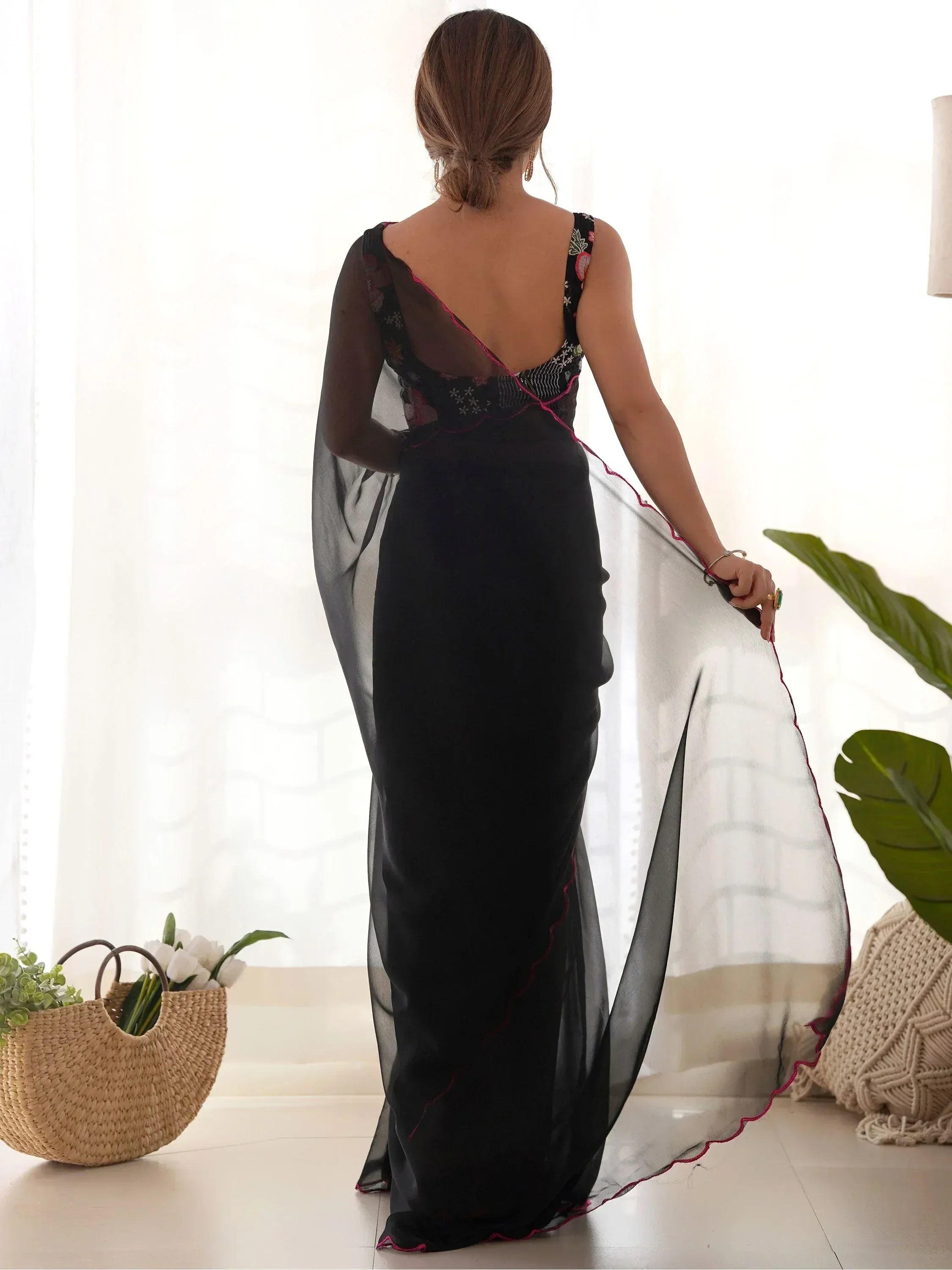 Black embroidered ethnic gown with sheer cape, back view, stylish Indian wear for women