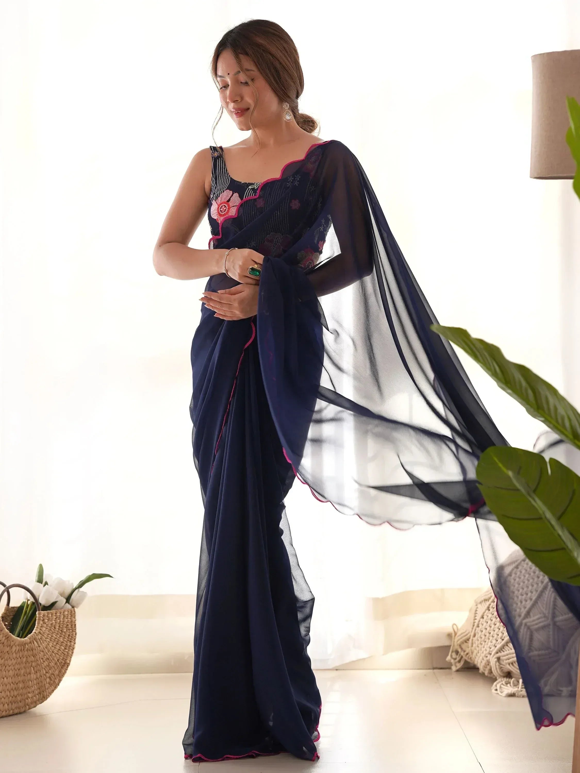 Navy blue embroidered saree with pink floral detailing, sheer dupatta, perfect for Indian ethnic wear occasions