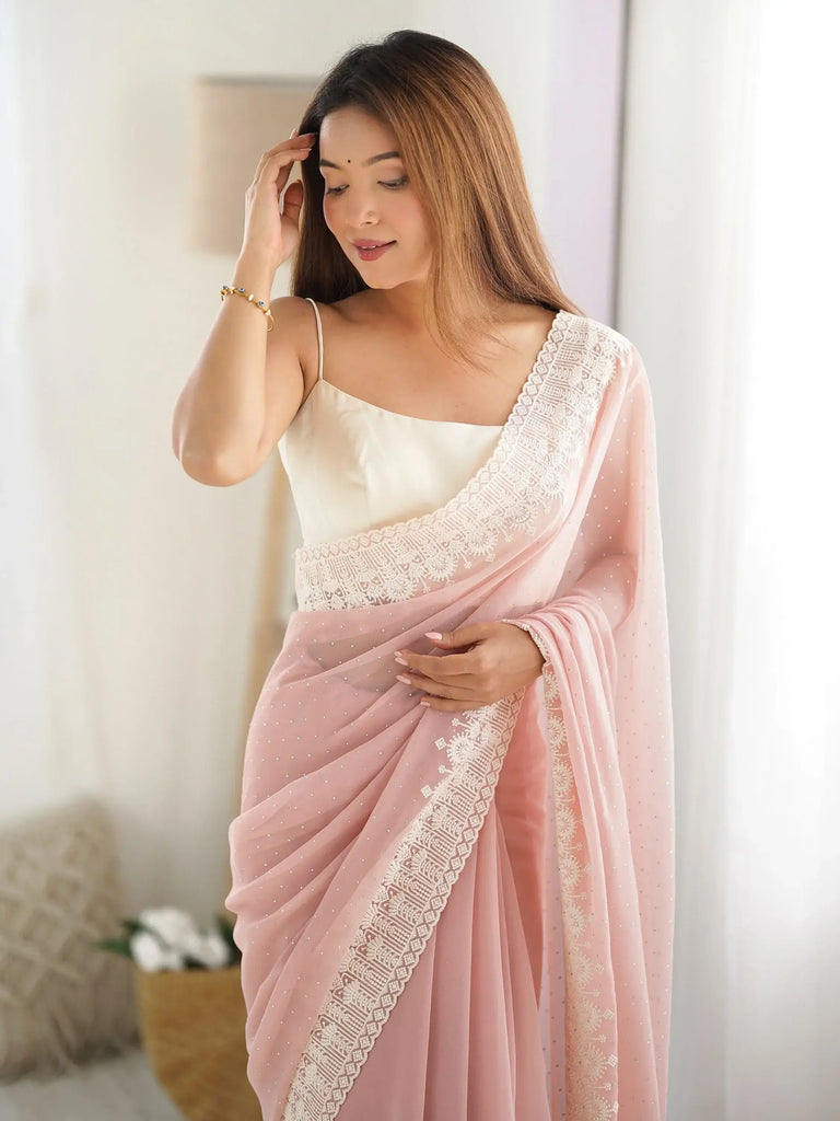 Breathtaking Peach Stone Work Georgette Engagement Wear Saree