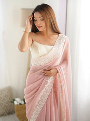 Breathtaking Peach Stone Work Georgette Engagement Wear Saree