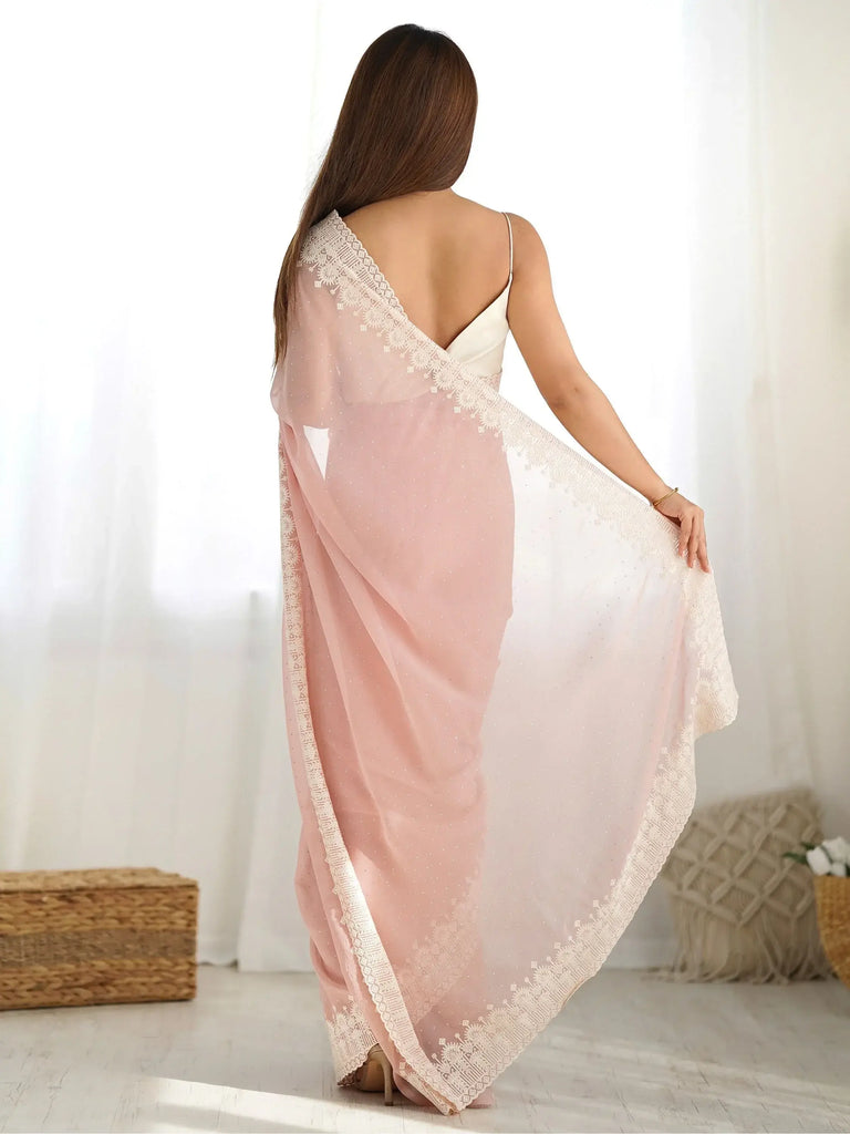 Breathtaking Peach Stone Work Georgette Engagement Wear Saree
