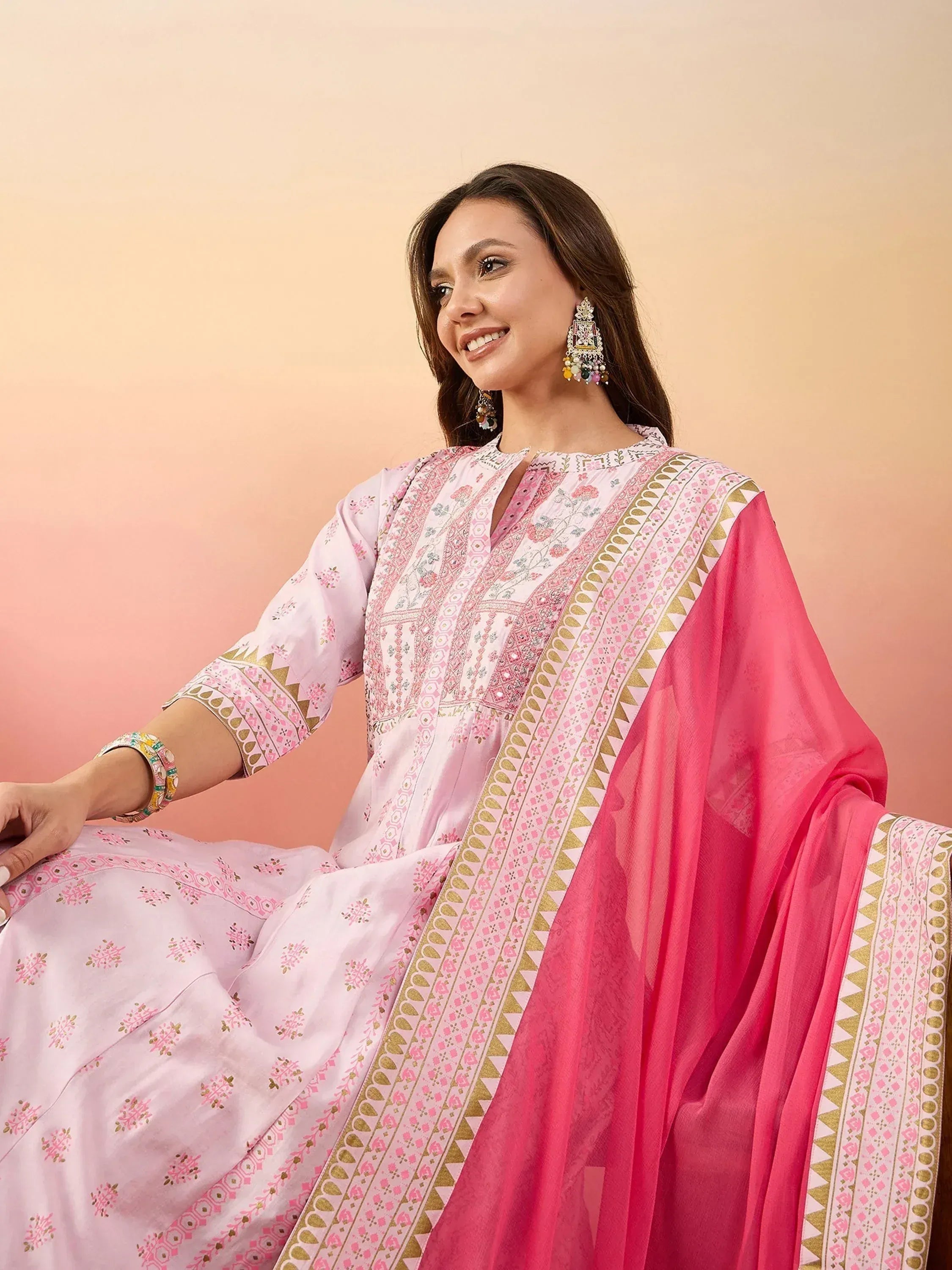 Pink printed salwar kameez with gold embroidery and matching dupatta, ethnic Indian wear