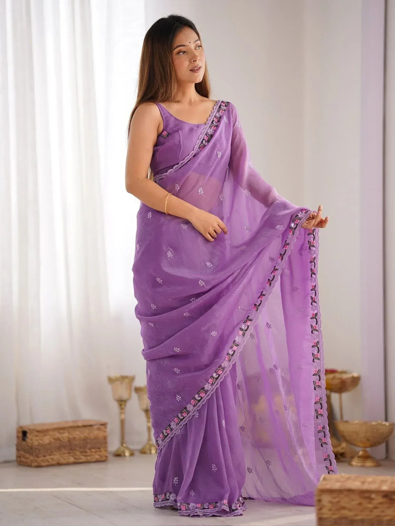 Purple embroidered saree with floral border, stylish Indian ethnic wear for women