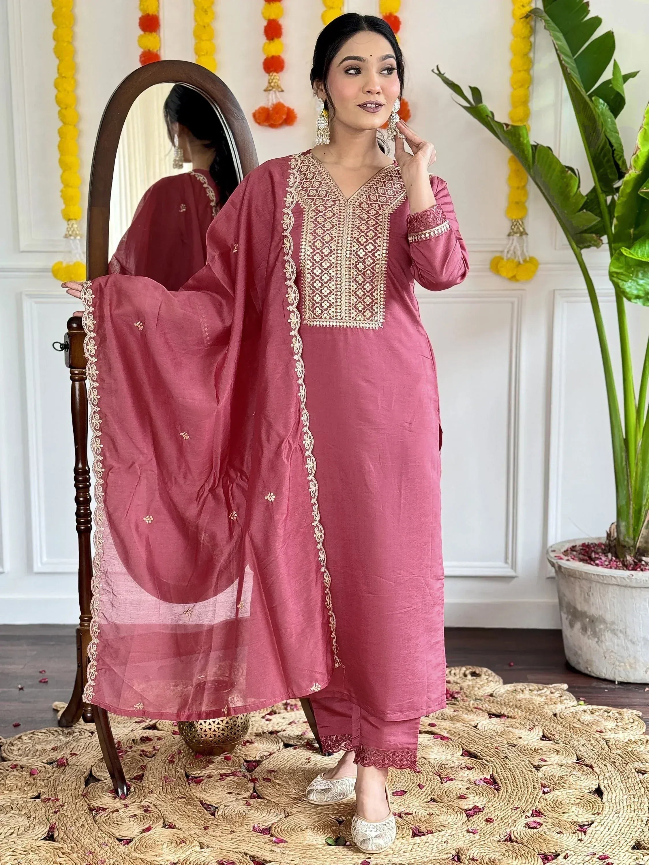 Pink embroidered ethnic salwar kameez with matching dupatta, perfect for festive occasions