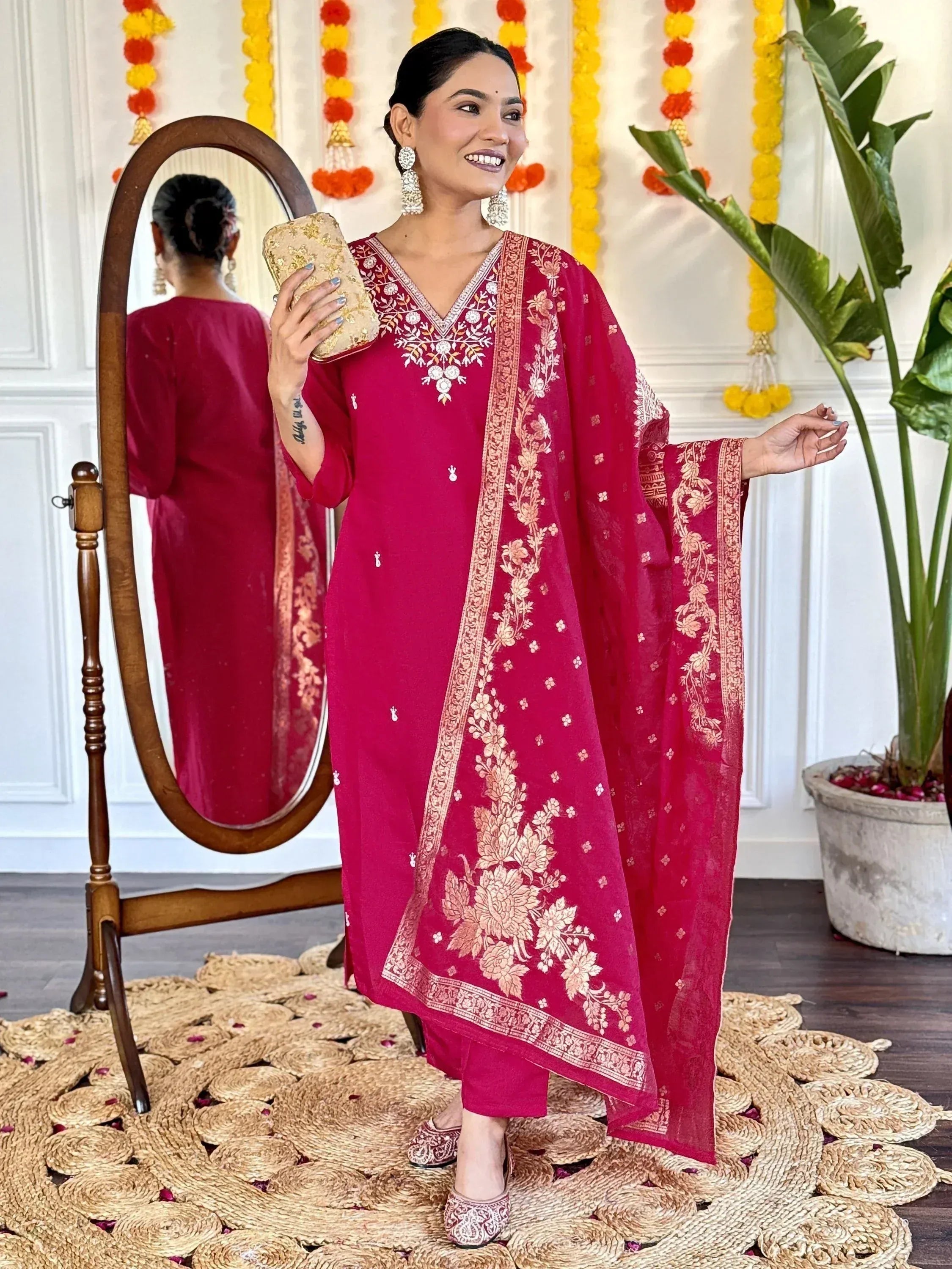 Elegant maroon ethnic kurti with gold floral embroidery, paired with matching pants and dupatta
