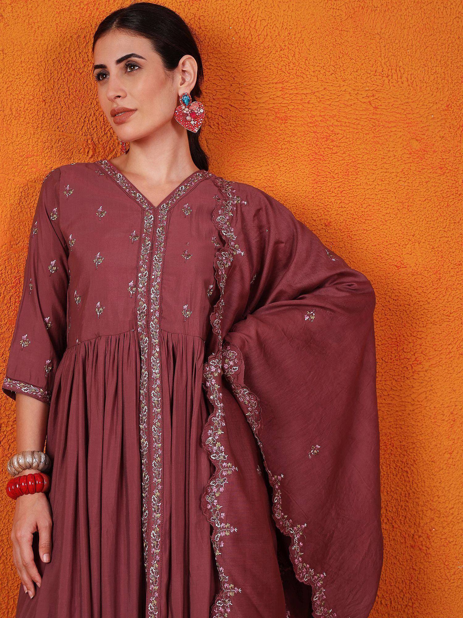 Maroon embroidered ethnic gown with floral detailing, perfect for Indian occasions and festive wear.