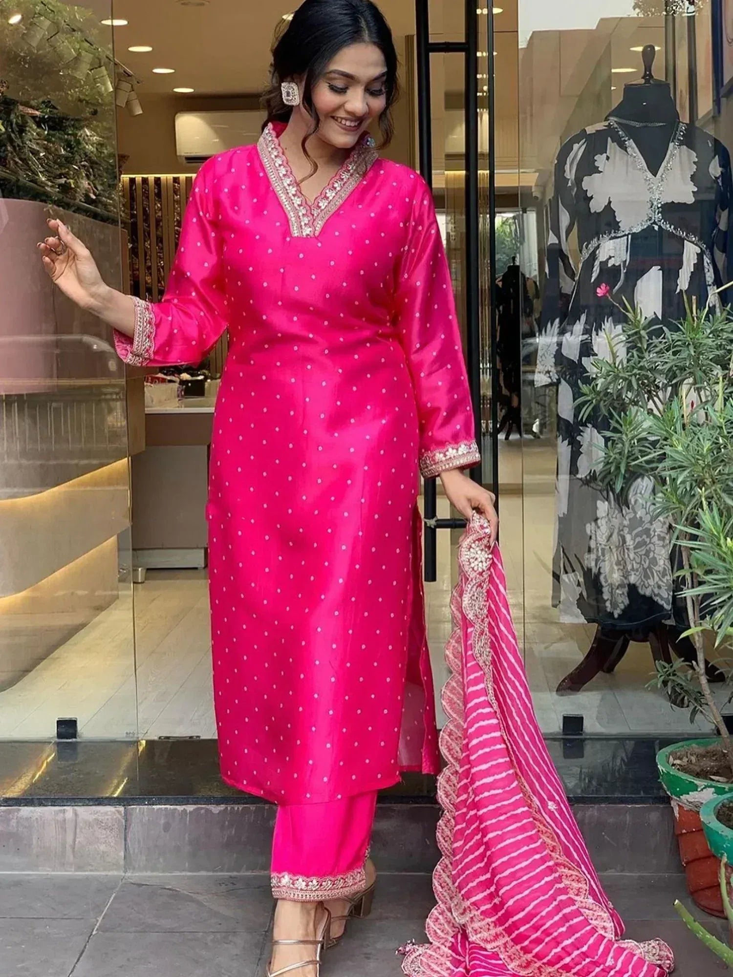 Pink polka dot salwar kameez with embroidered neckline and matching dupatta, stylish Indian ethnic wear