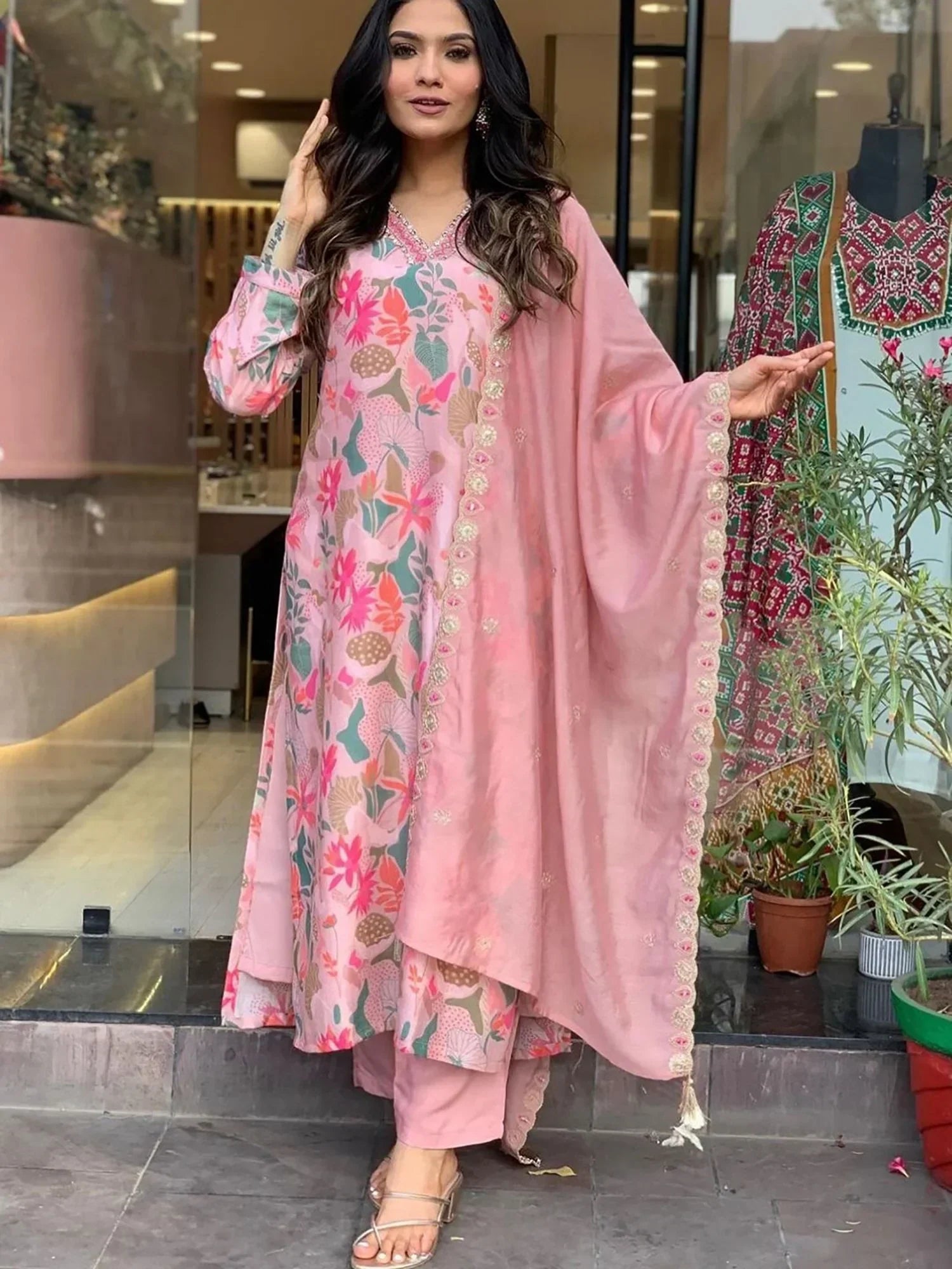 Woman in pink floral printed salwar kameez with matching dupatta, Indian ethnic wear
