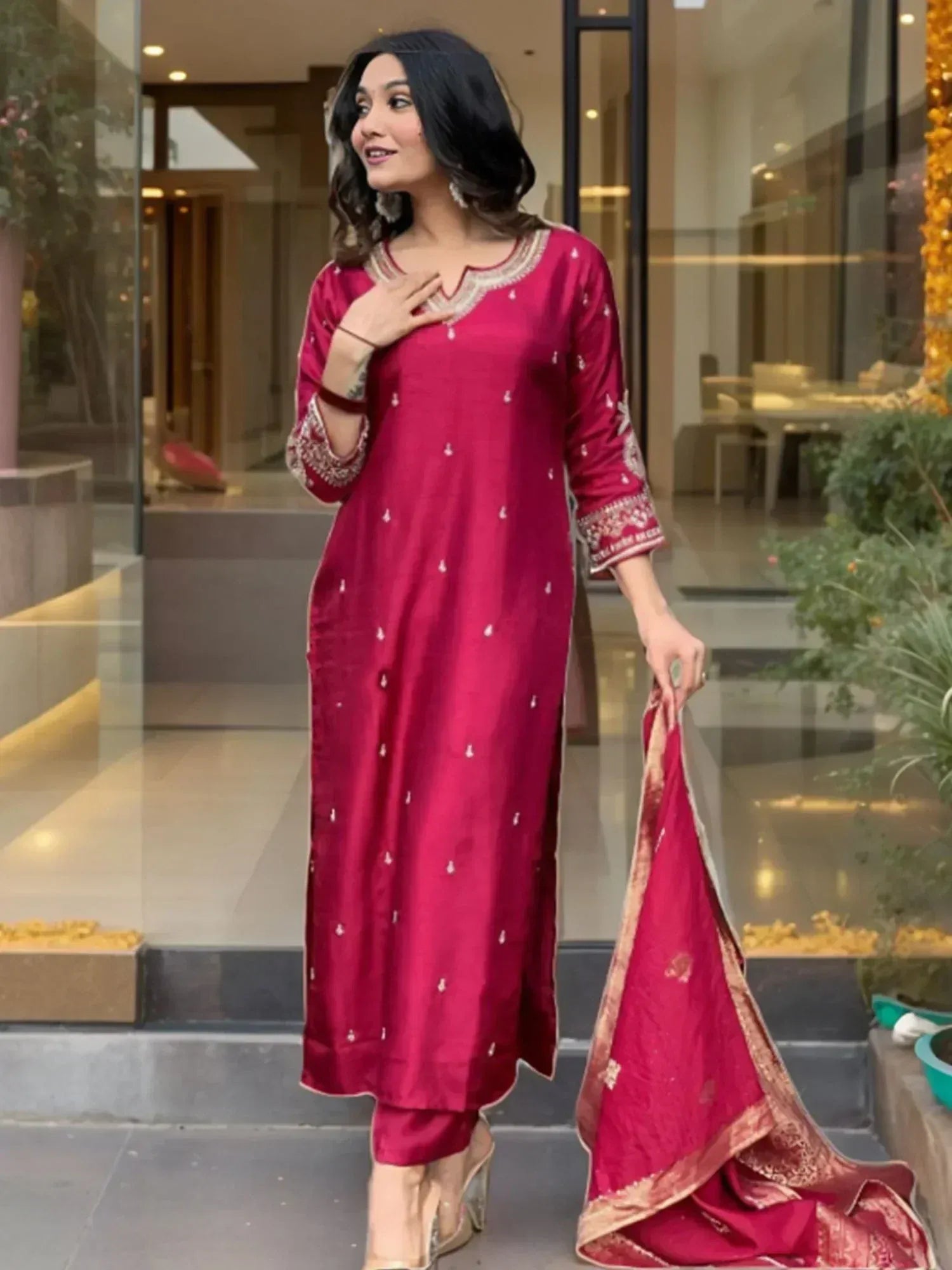 Woman in maroon embroidered salwar kameez with matching dupatta, Indian ethnic wear