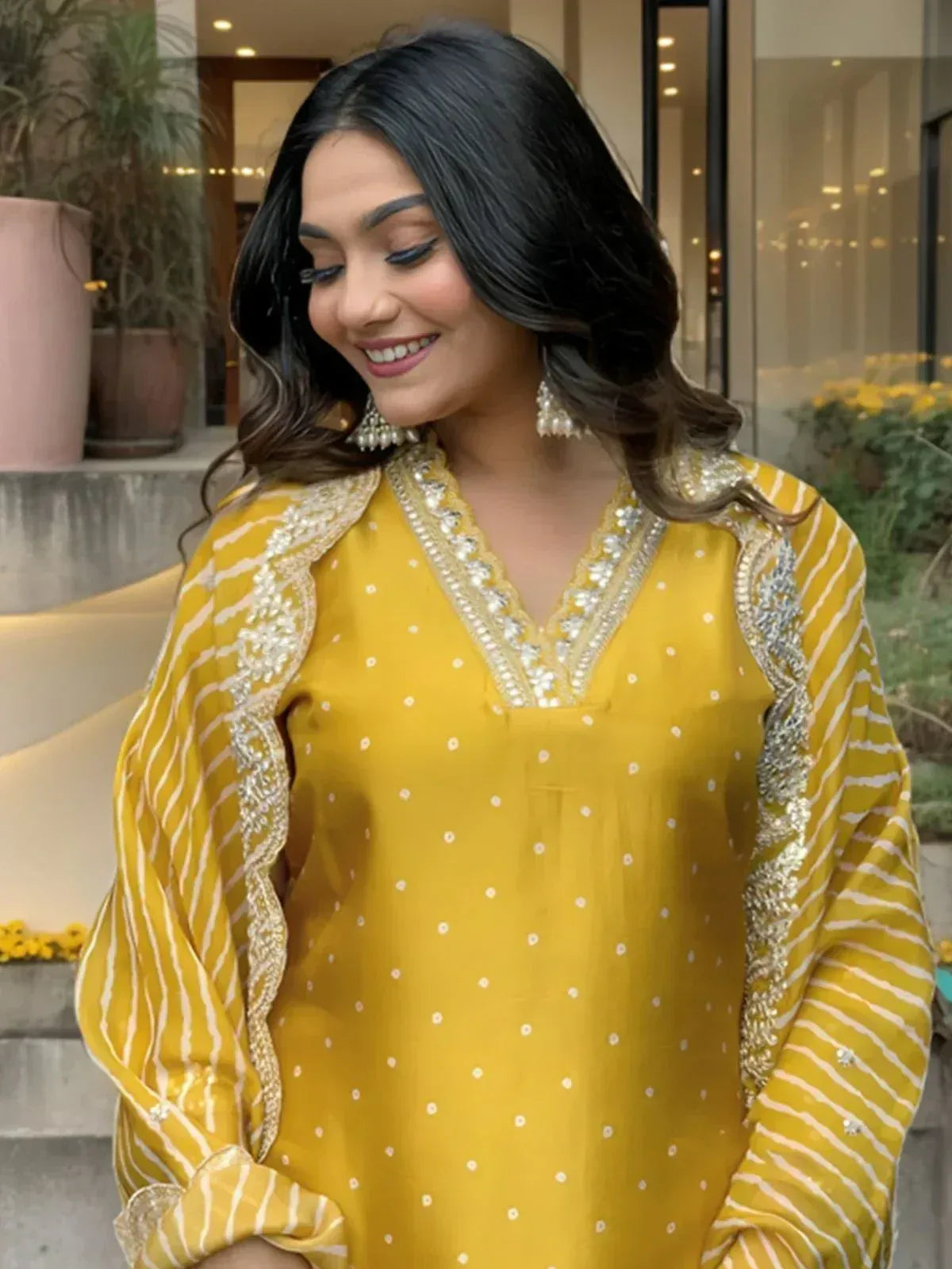 Yellow embroidered ethnic kurta with white stripes and polka dots, perfect for Indian festive wear