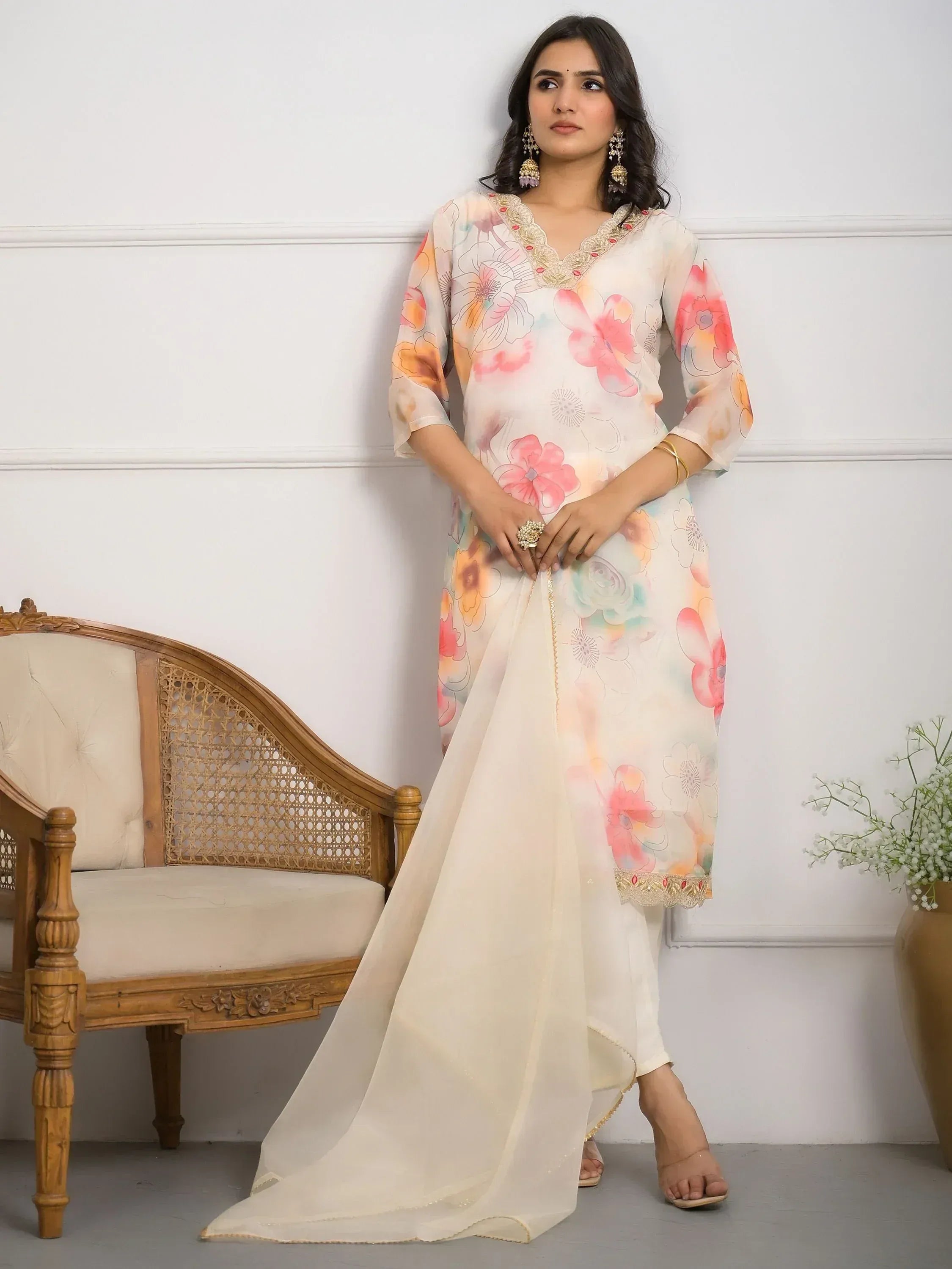 Floral printed ethnic kurta with lace trim and matching dupatta, styled with gold jewelry for Indian wear