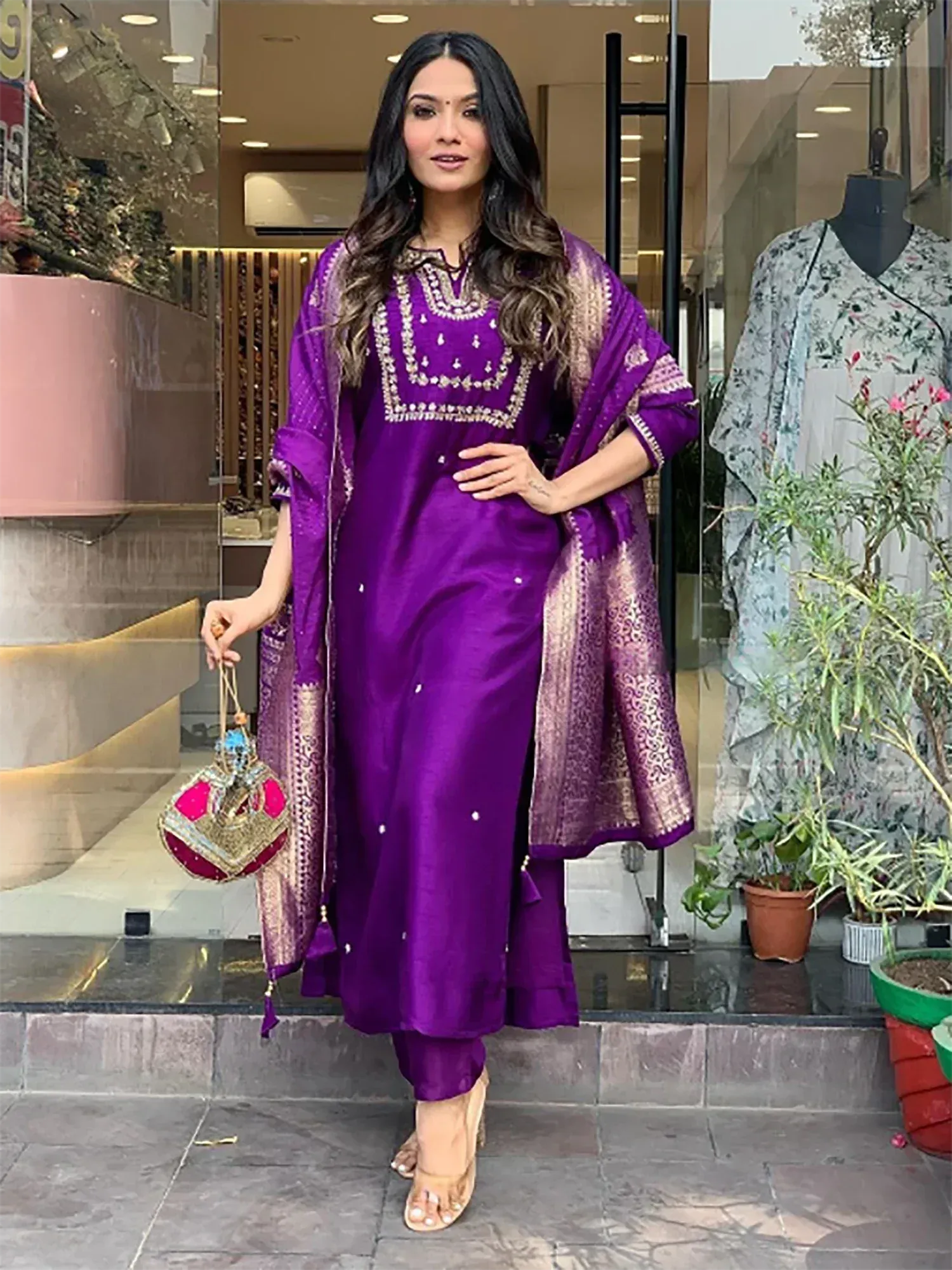 Purple embroidered salwar kameez with gold dupatta, perfect for Indian ethnic wear occasions.