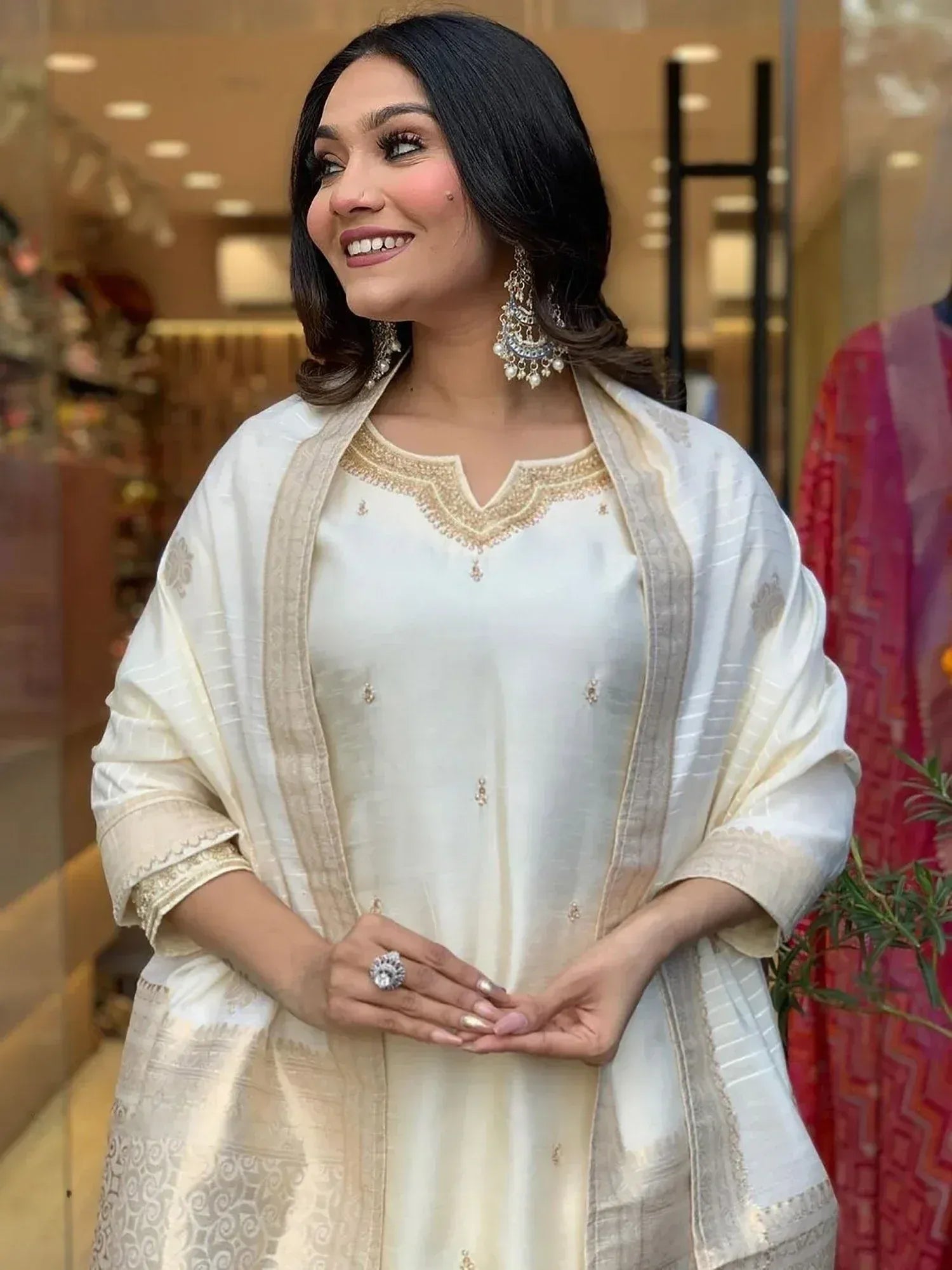 Elegant ivory ethnic kurta with gold embroidery and matching dupatta, perfect for festive occasions.