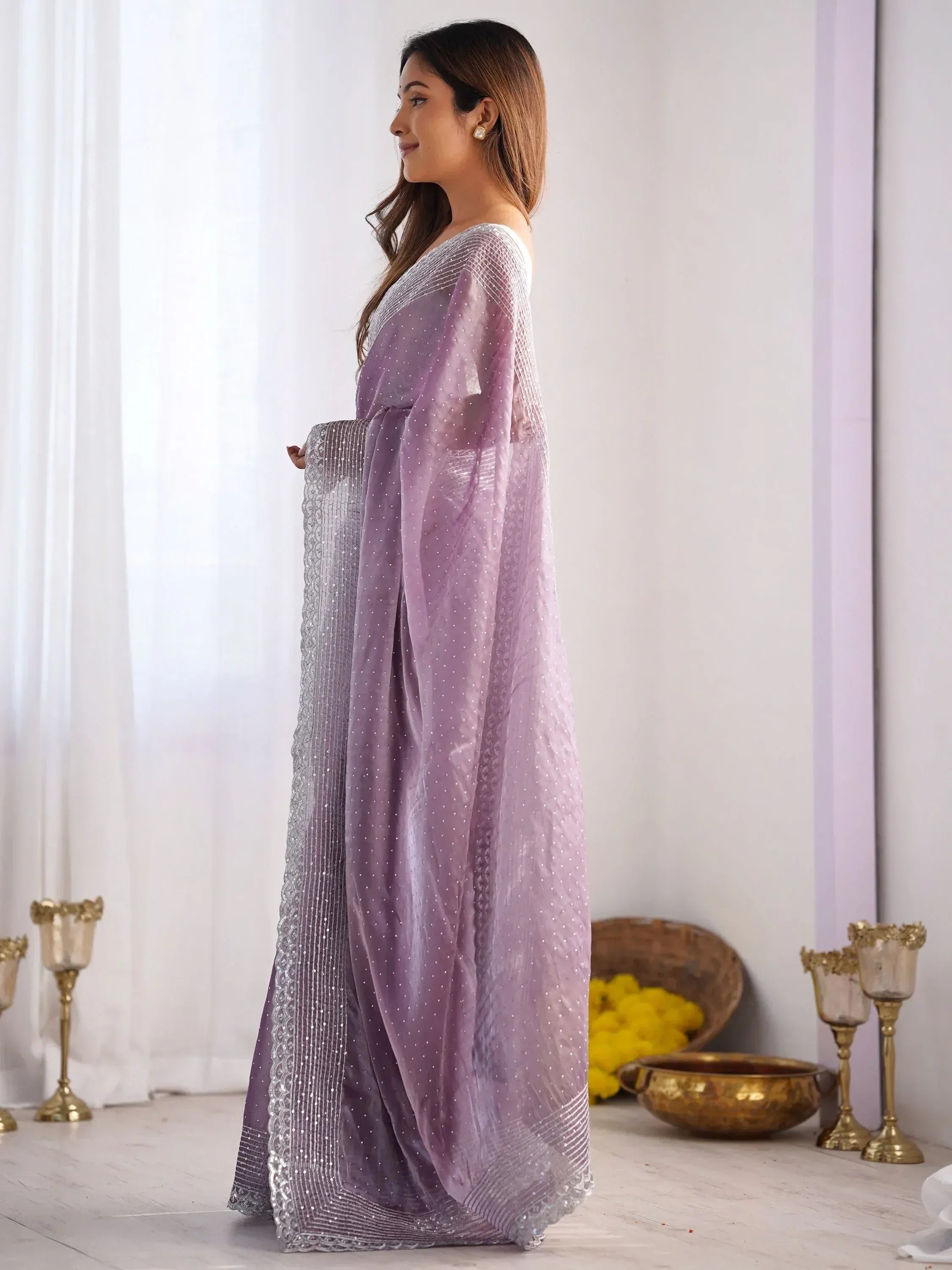 Lavender ethnic gown with silver embellishments, perfect for Indian occasions and festive wear.